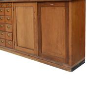 An Oak and Pine Shop Cabinet 169" W x 15.5" D x 114" H — Germany, 20th Century