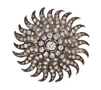 A Silver Topped Gold and Diamond Sunburst Pendant/Brooch, 11.30 dwts.