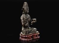 A rare Chinese patinated bronze figure of Guanyin, Yunnan, 12th to 14th century 珍罕銅加漆觀音像及底座 雲南大理 十二至十四世紀