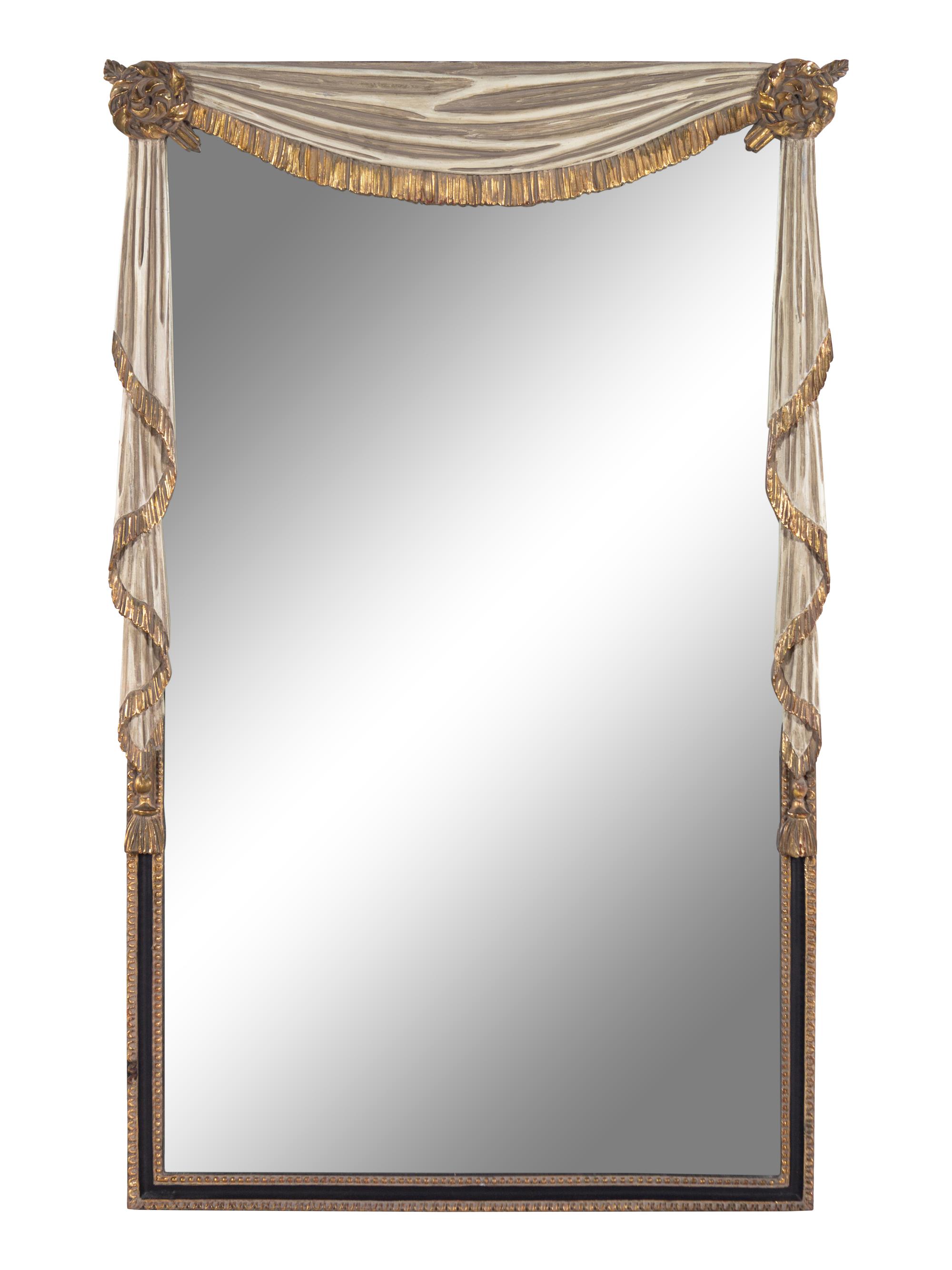 A White Painted and Parcel Gilt Trompe L'Oeil Mirror with Swagged Drapery