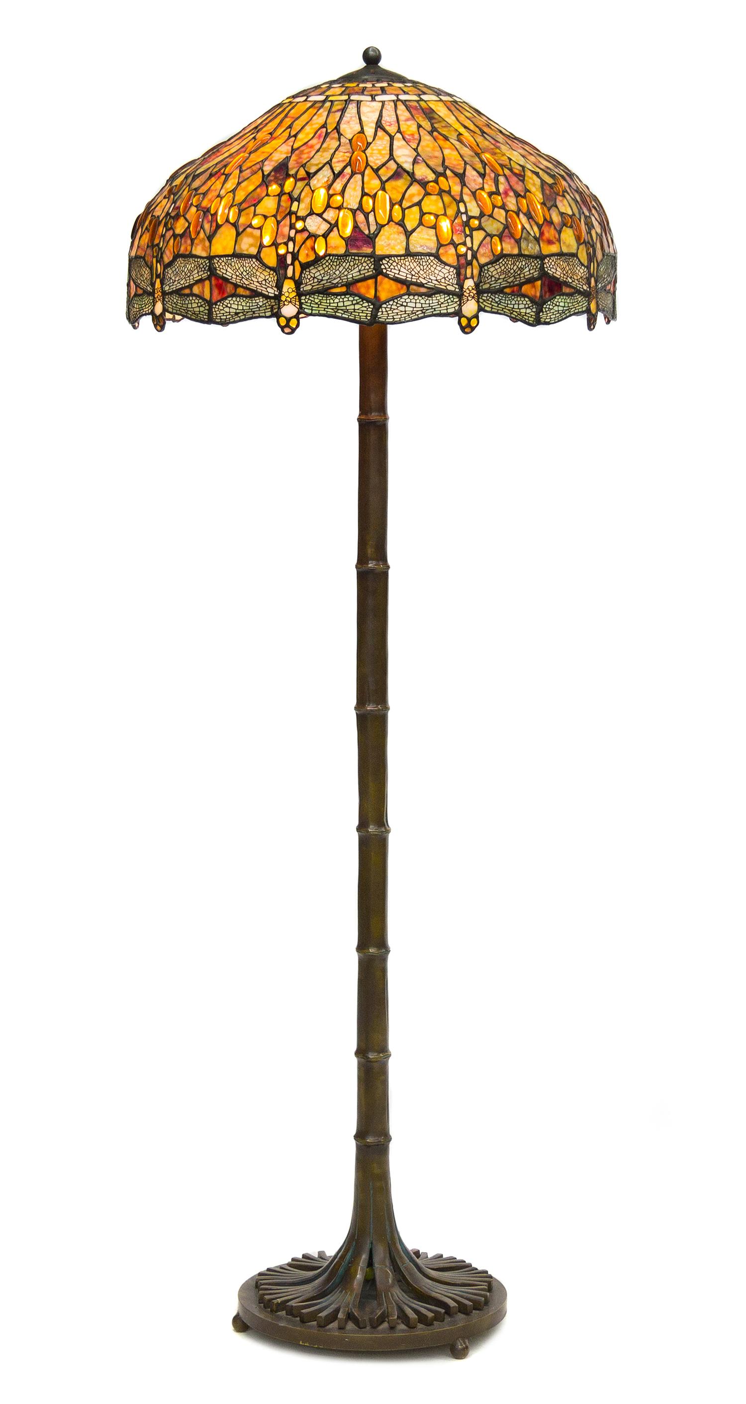 An American Leaded Glass and Bronze Floor Lamp Height 65 1/2 inches.