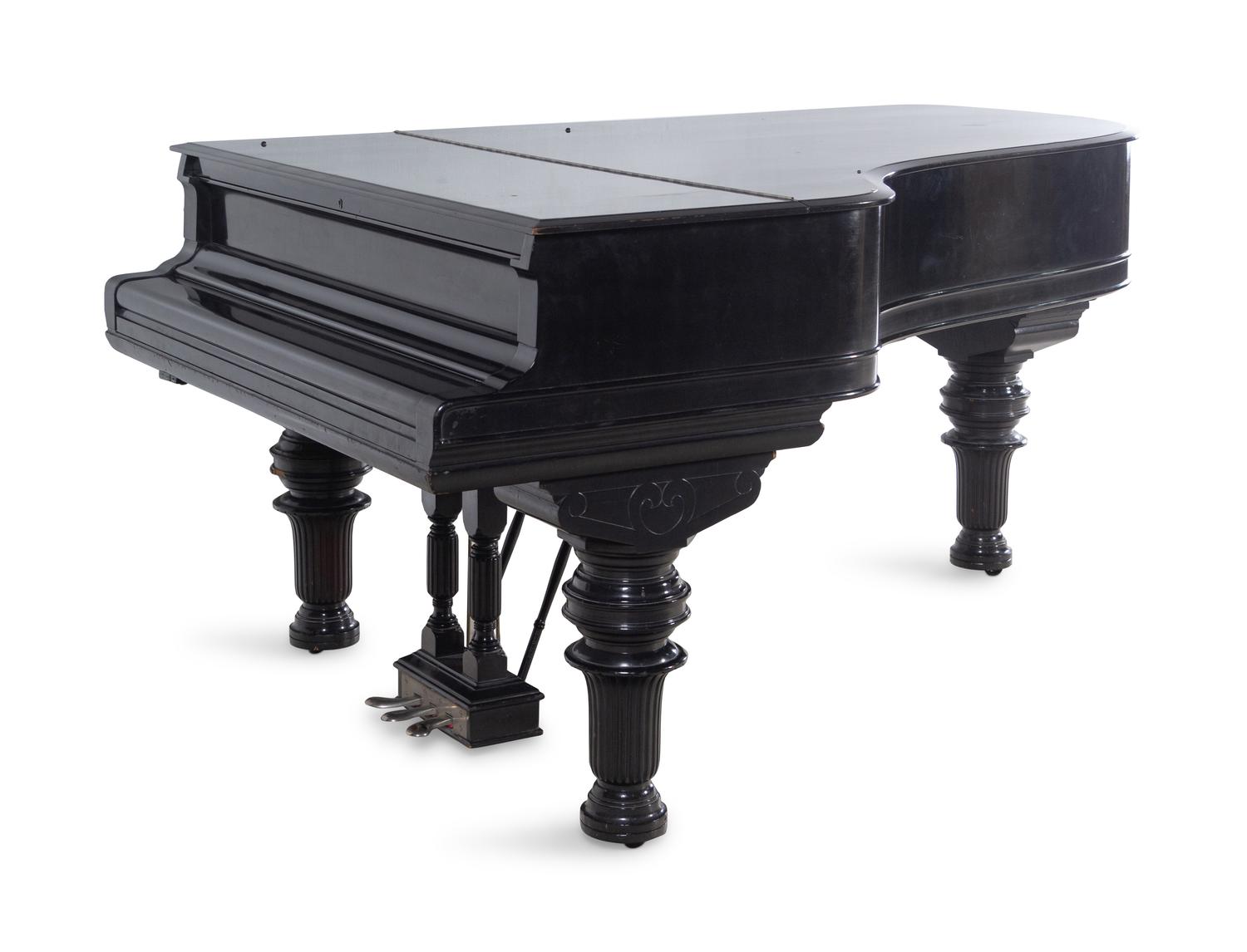 A Steinway and Sons Ebonized Concert Grand Piano