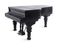 A Steinway and Sons Ebonized Concert Grand Piano