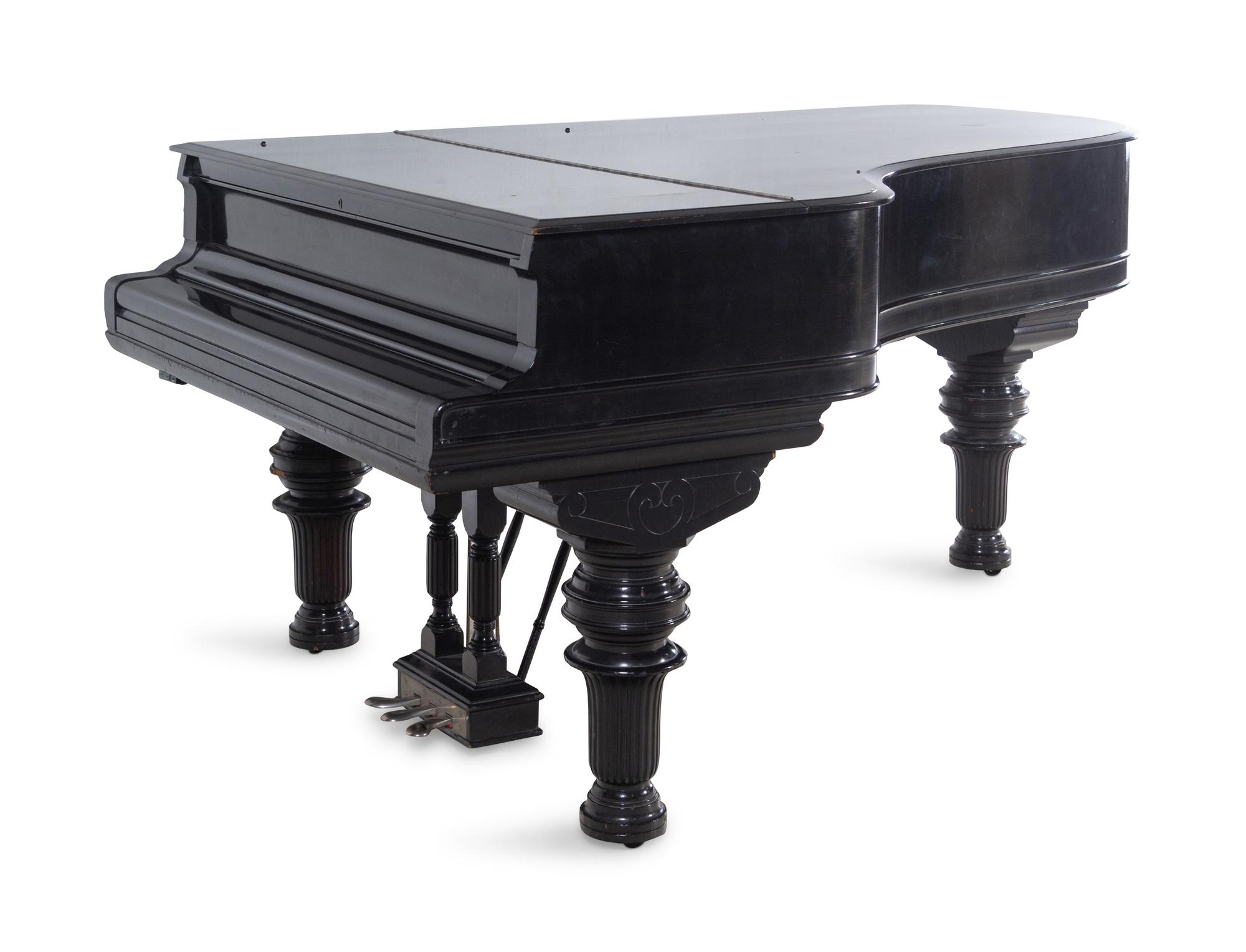 A Steinway and Sons Ebonized Concert Grand Piano