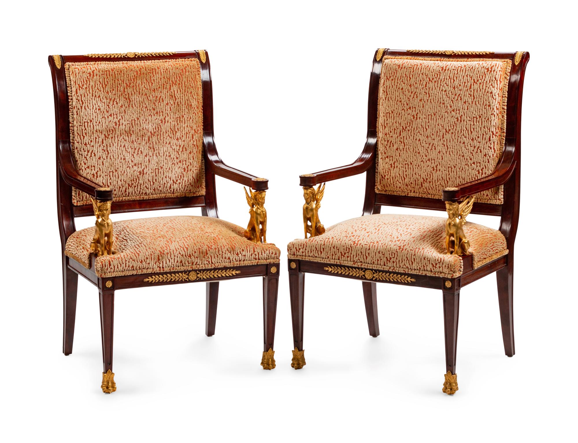 A Pair of Empire Style Gilt-Bronze-Mounted Mahogany Fauteuils