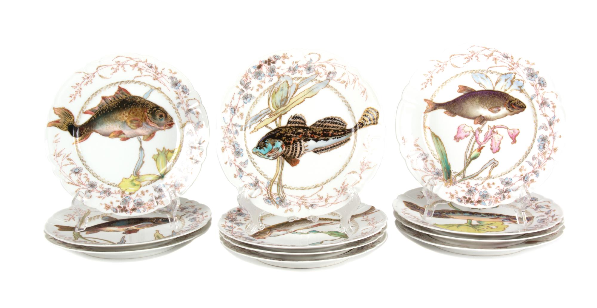 Eleven Limoges Porcelain Fish Plates Diameter 9 1/8 inches.