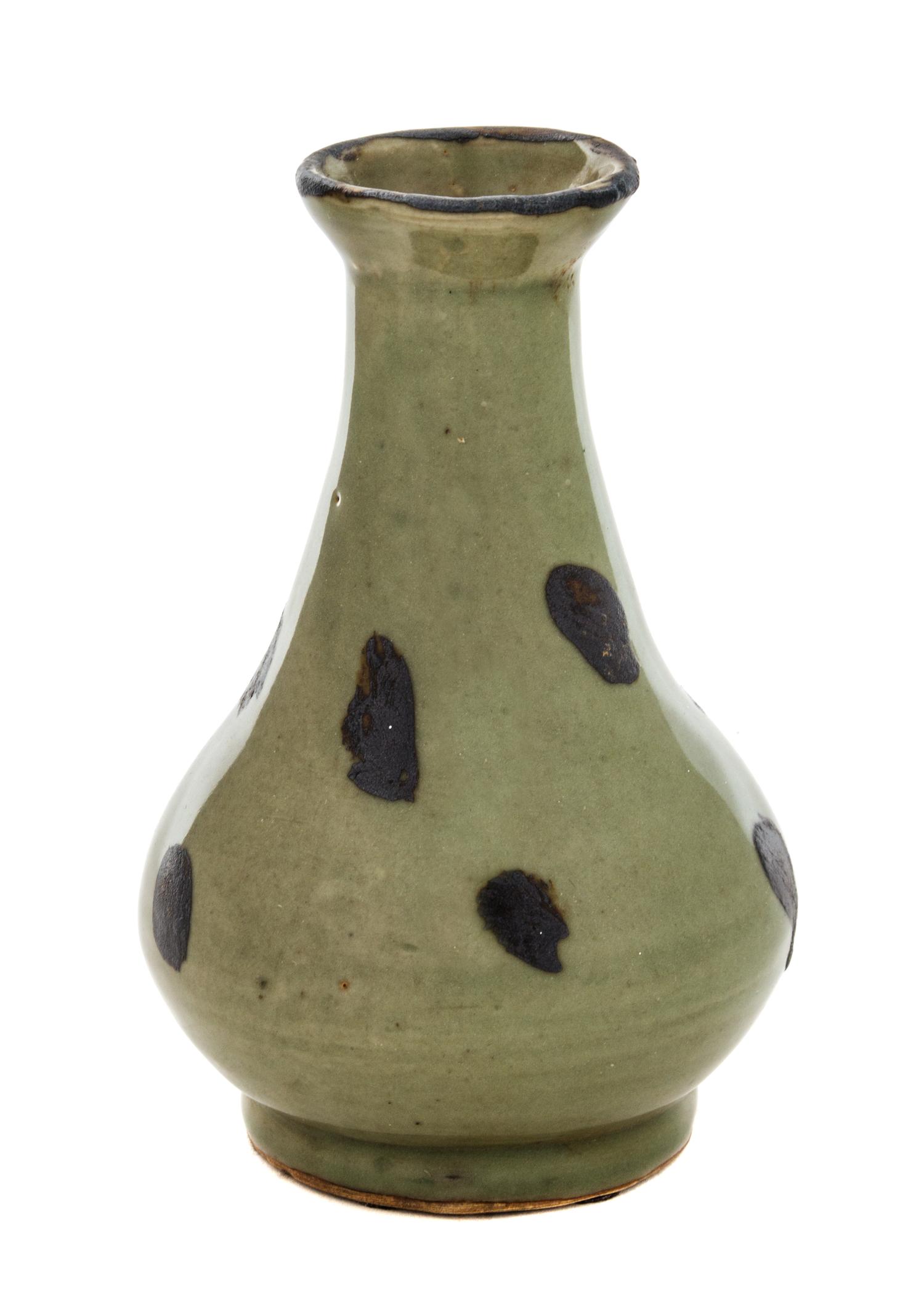 A Celadon Glazed Iron Spotted Porcelain Vase