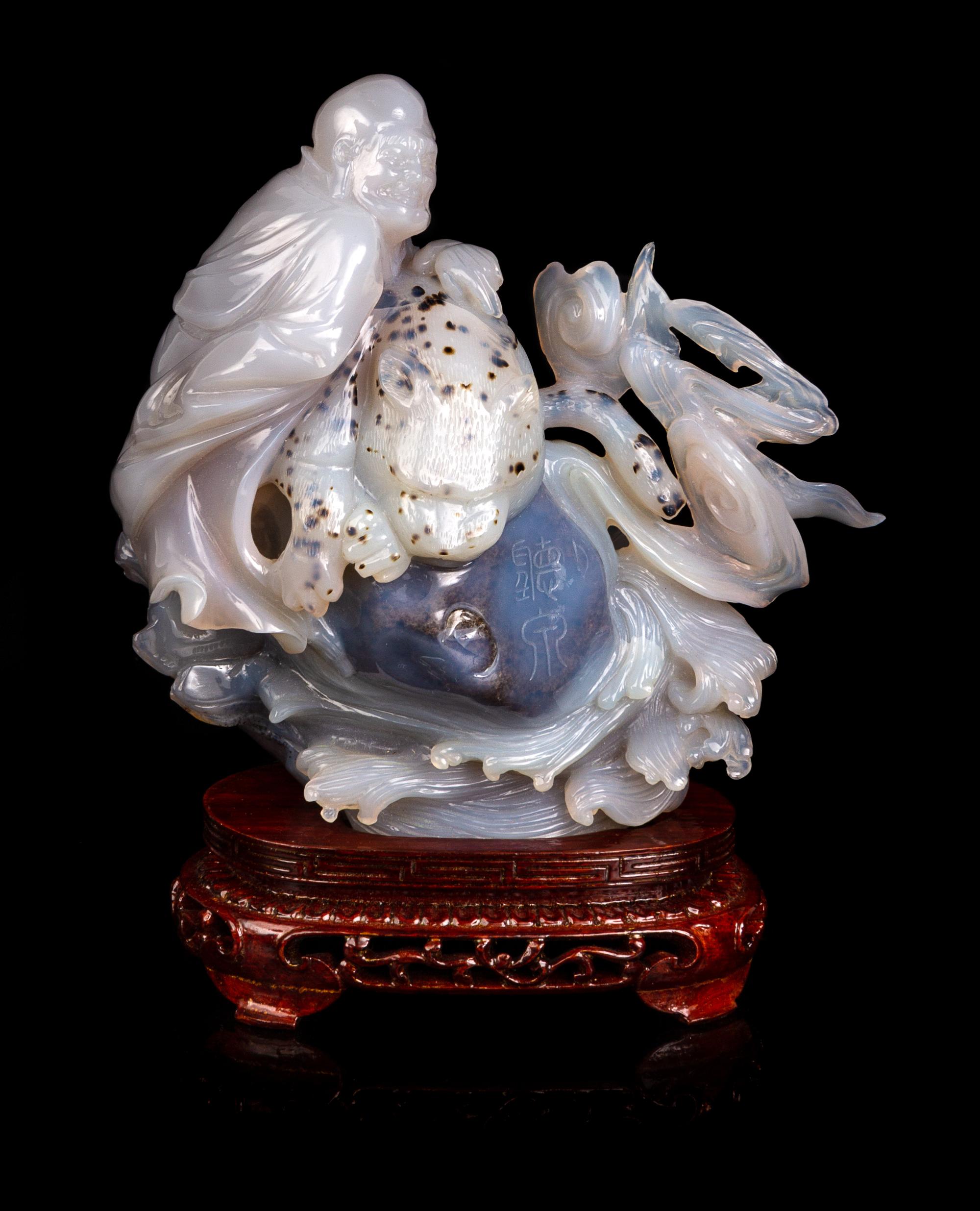 A Chinese Carved Agate Figural Group