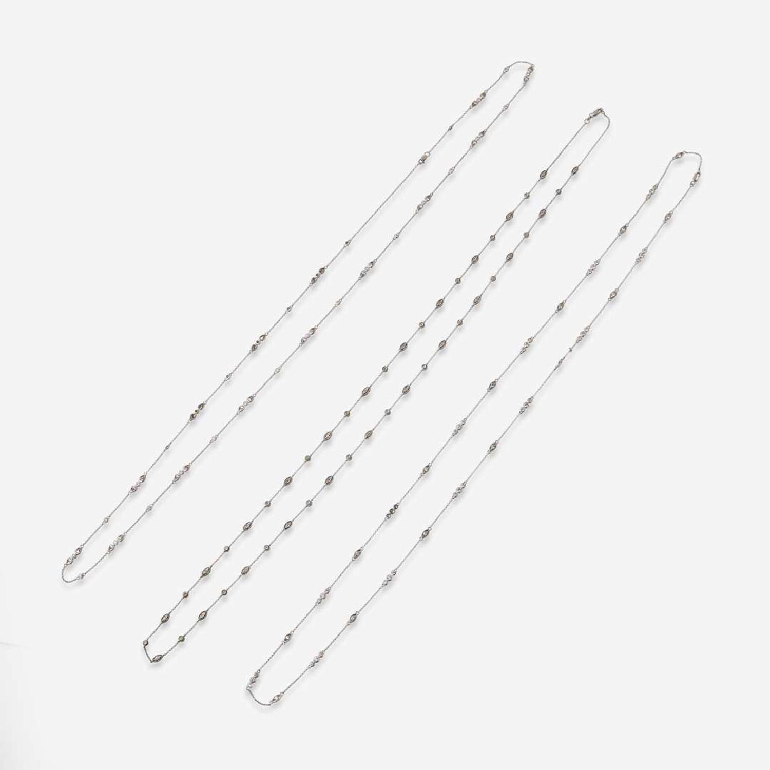 A Set of Three 14K White Gold and Diamond Chains