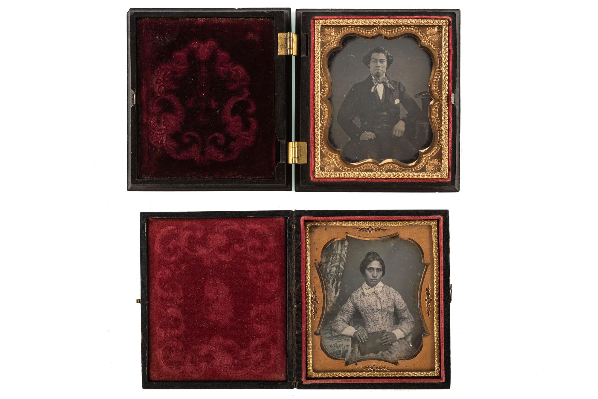 [EARLY PHOTOGRAPHY - PORTRAITURE]. A pair of daguerreotype portraits of mixed race subjects.