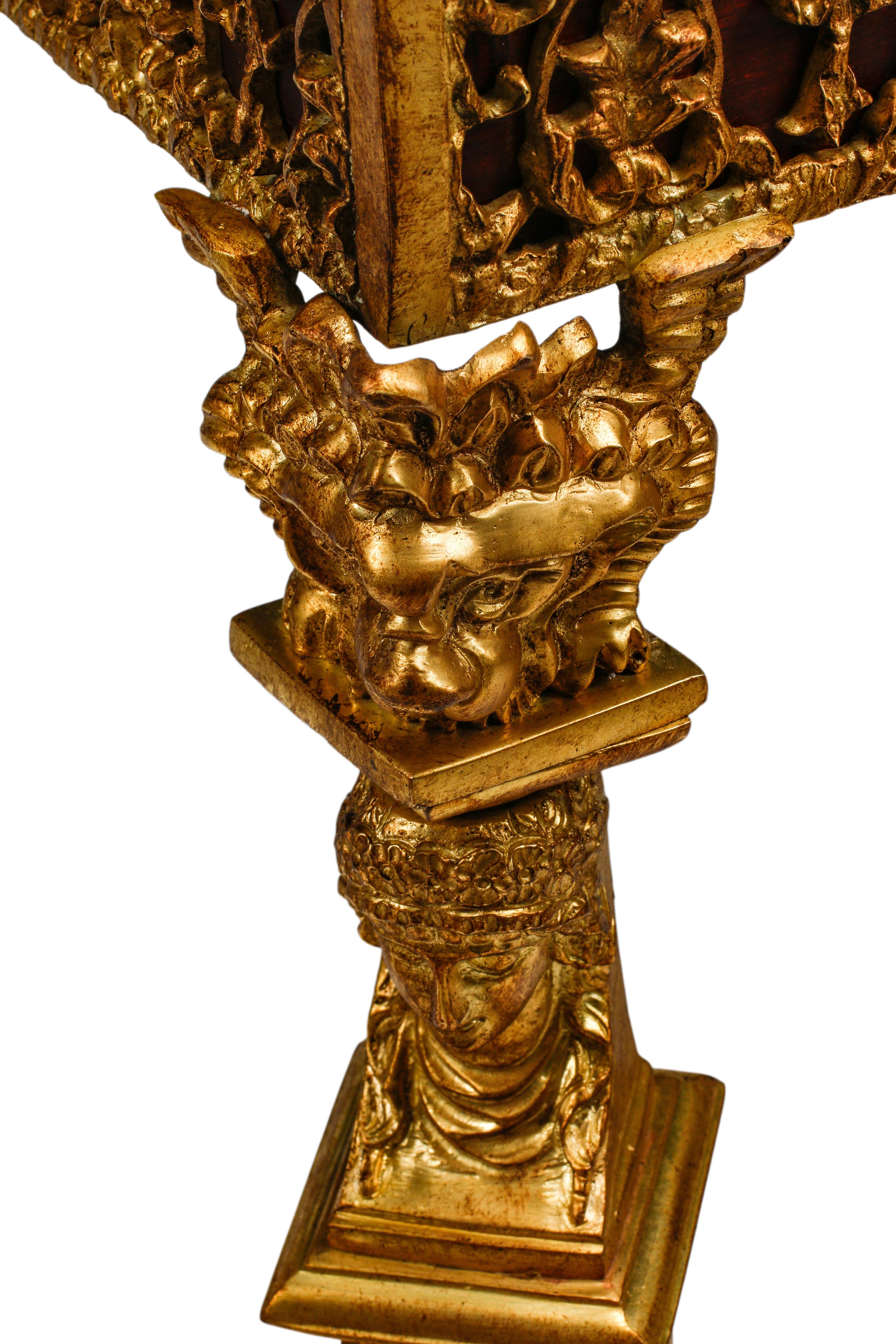 An Empire Style Gilt Bronze Mounted Mahogany and Marble-Top Game Table with a Rock Crystal and Tiger's Eye Chess Set