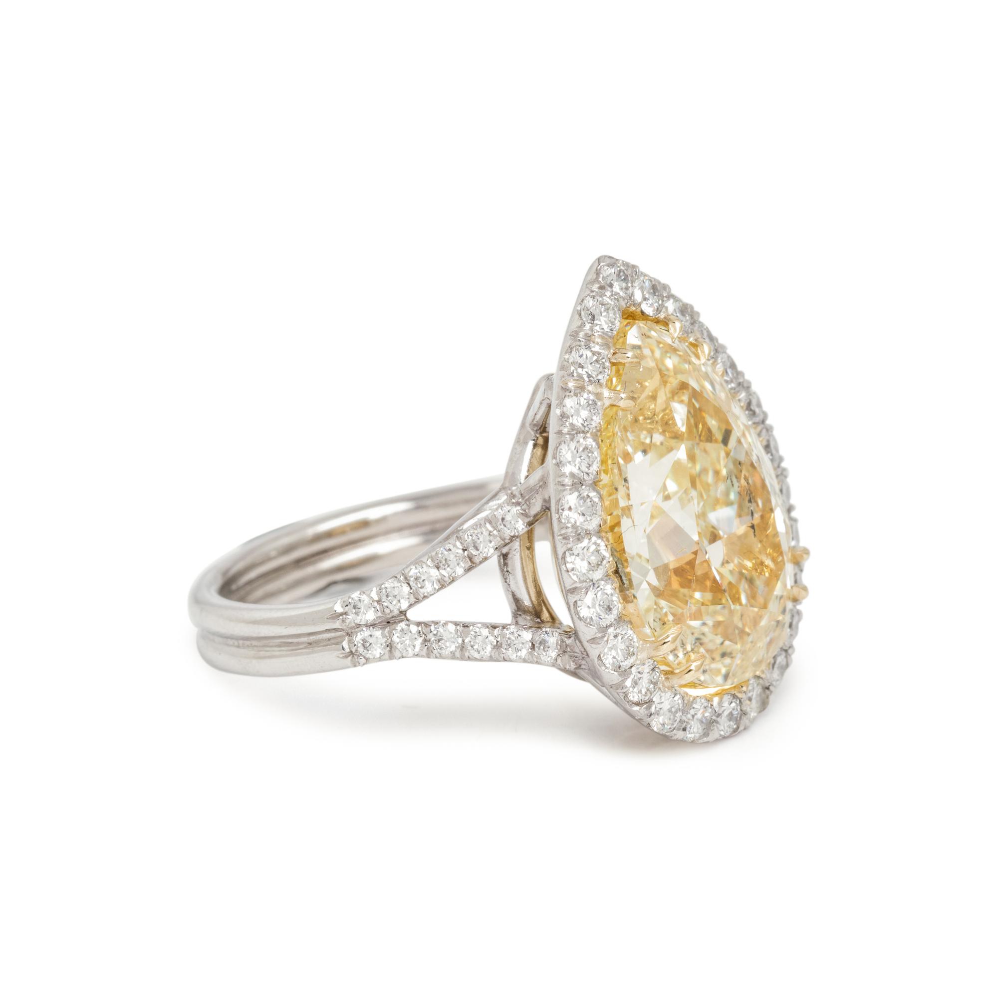 FANCY YELLOW DIAMOND AND DIAMOND RING