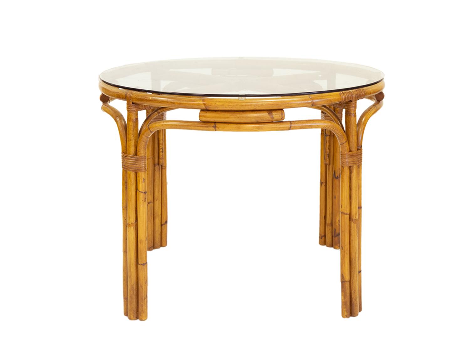 A Maguire Rattan Table and Four Chairs
