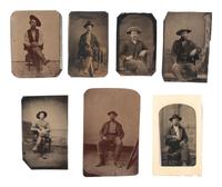 [WESTERN AMERICANA]. 8 tintypes of cowboys, one armed with a revolver.