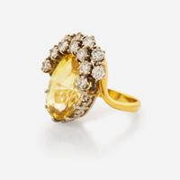 An 18K Yellow Gold, Platinum, Diamond, and Yellow Sapphire Ring