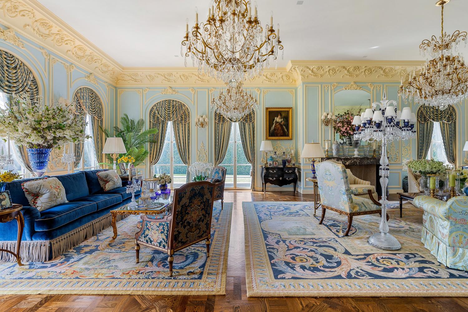 A Pair of E.J. Victor Regency Style Parcel Gilt Mahogany Sideboards