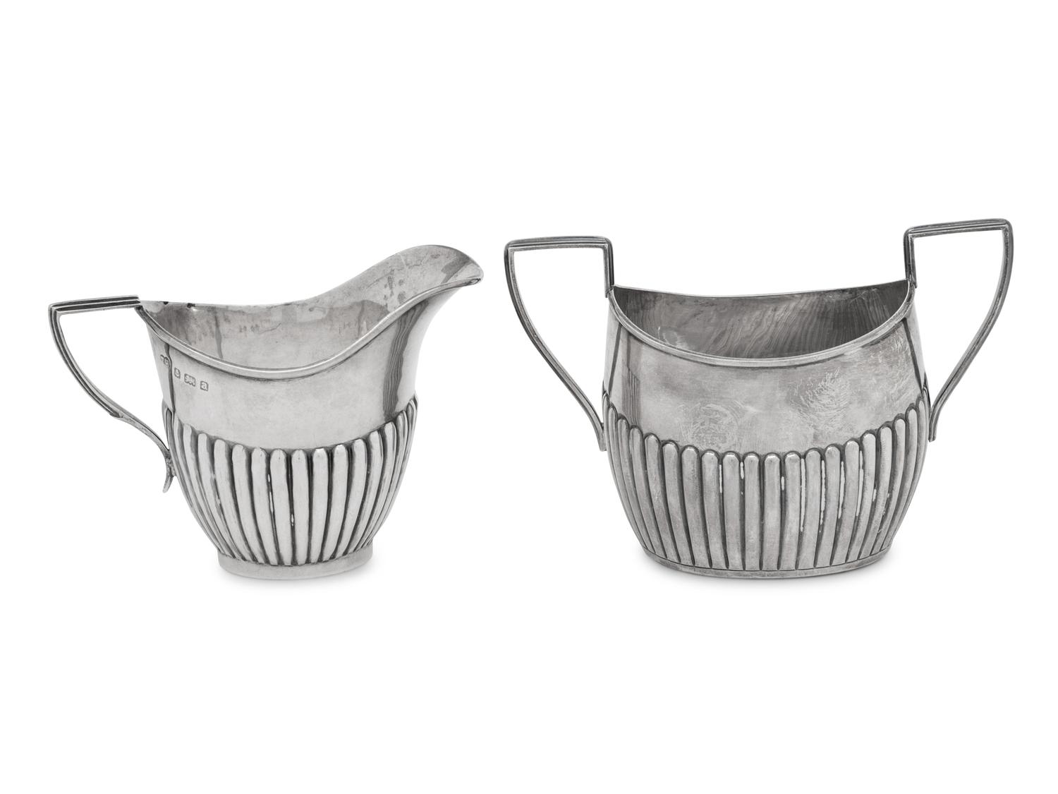 An Assembled Edwardian Silver Three-Piece Bachelor's Tea Service