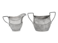An Assembled Edwardian Silver Three-Piece Bachelor's Tea Service