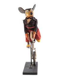 A Carved and Painted Folk Art Mickey Mouse Toy