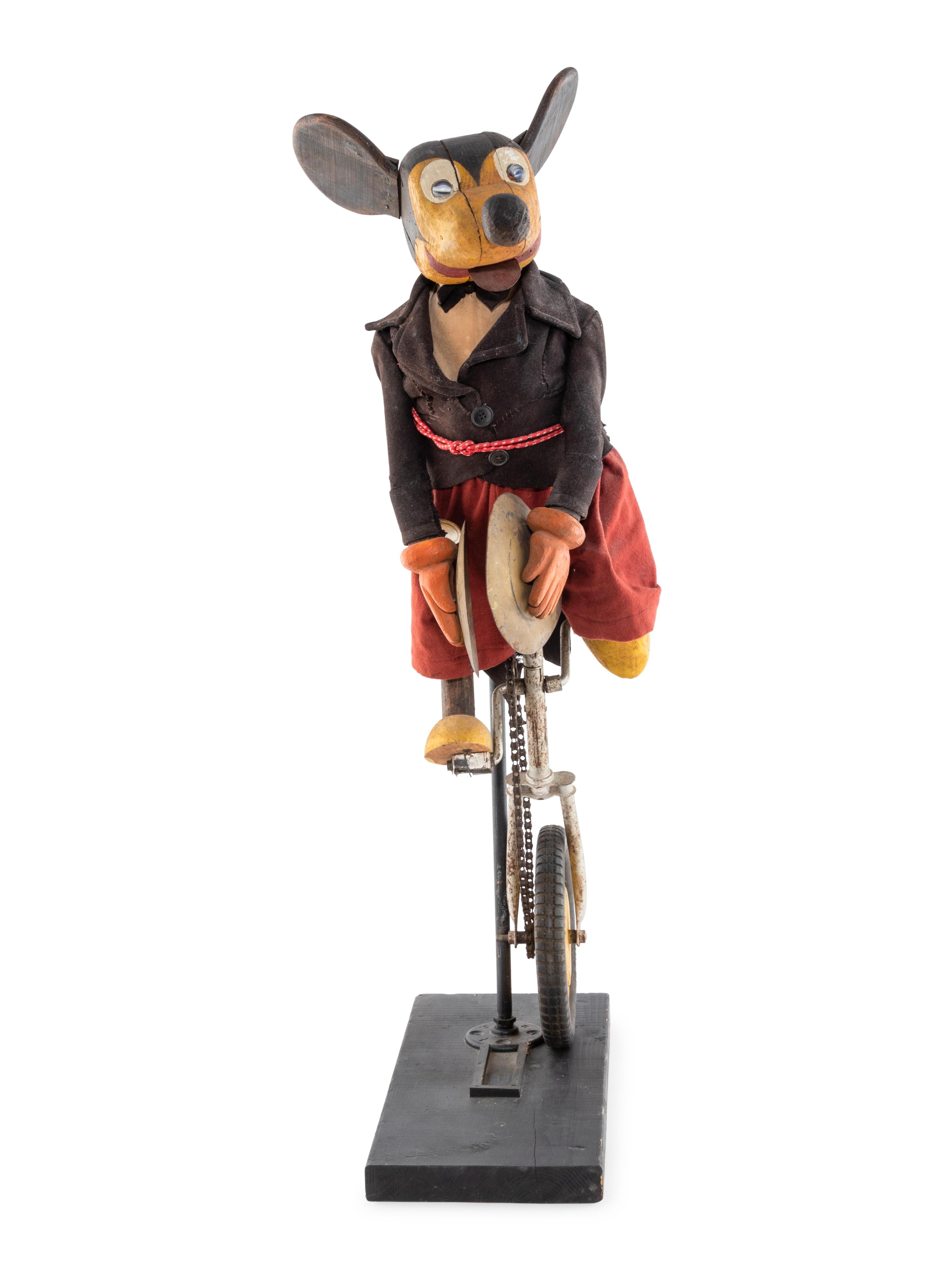 A Carved and Painted Folk Art Mickey Mouse Toy