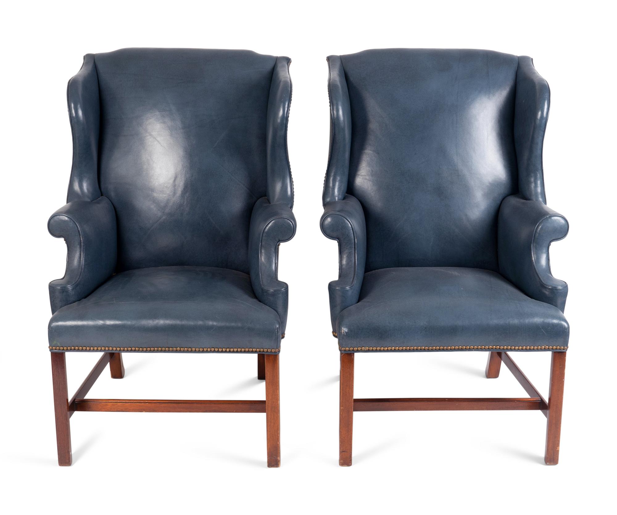 A Pair of George II Style Leather Upholstered Wingback Chairs — 19TH CENTURY