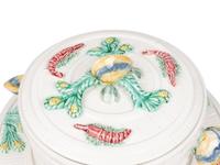 A Mottahedeh Glazed Earthenware Seafood Tureen and Tray