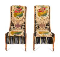 A Pair of Danish Walnut Slipper Chairs with Needlepoint Upholstery