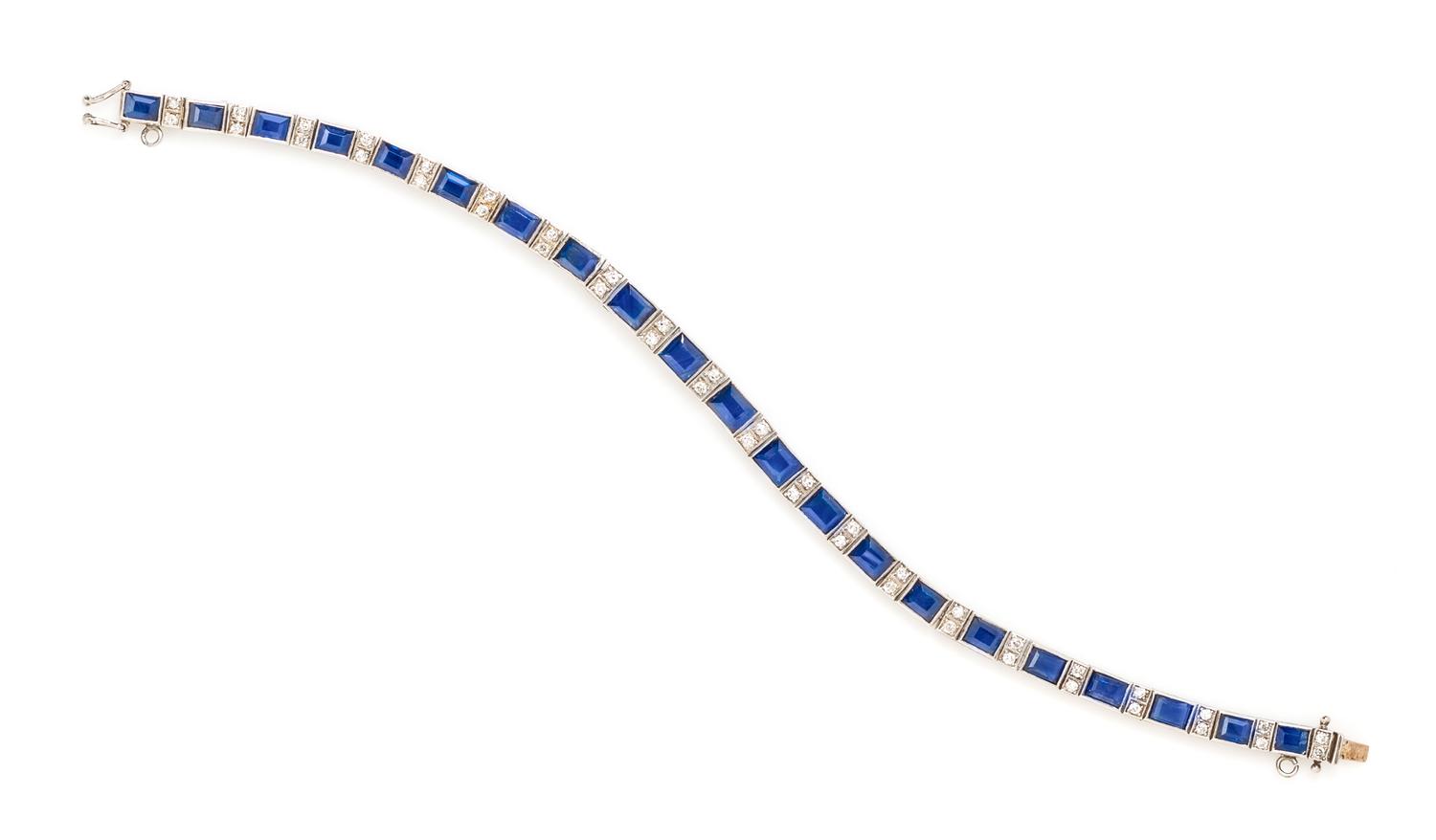 A White Gold, Sapphire and Diamond Line Bracelet, 10.90 dwts.