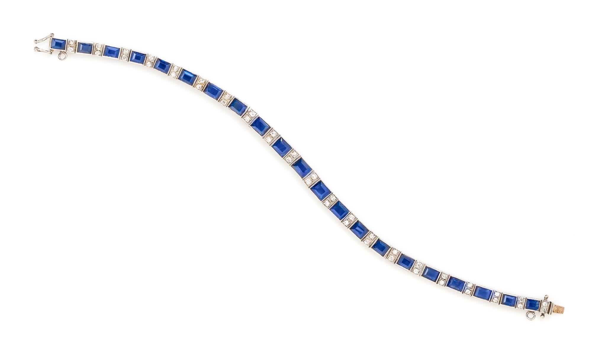 A White Gold, Sapphire and Diamond Line Bracelet, 10.90 dwts.