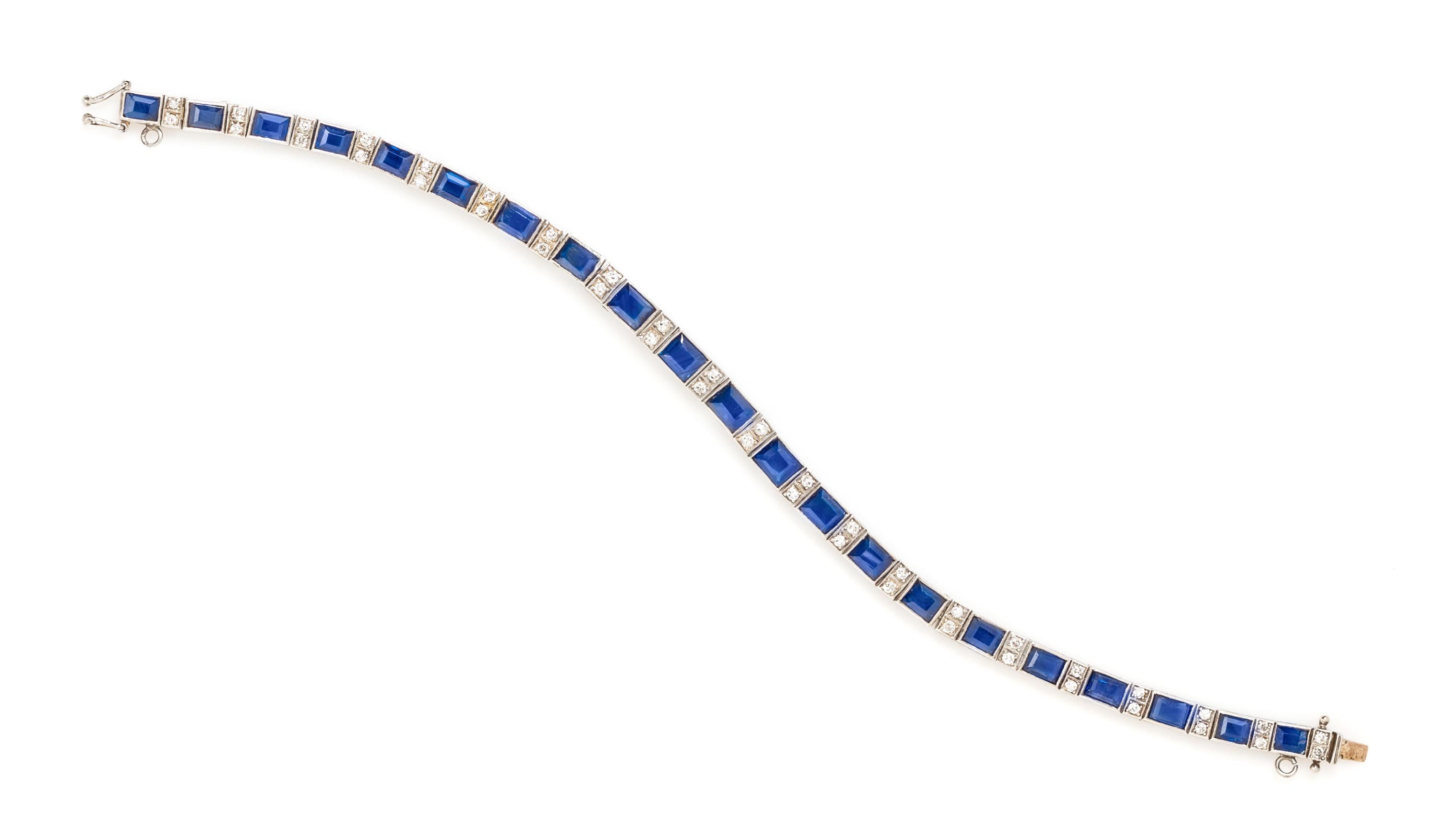 A White Gold, Sapphire and Diamond Line Bracelet, 10.90 dwts.