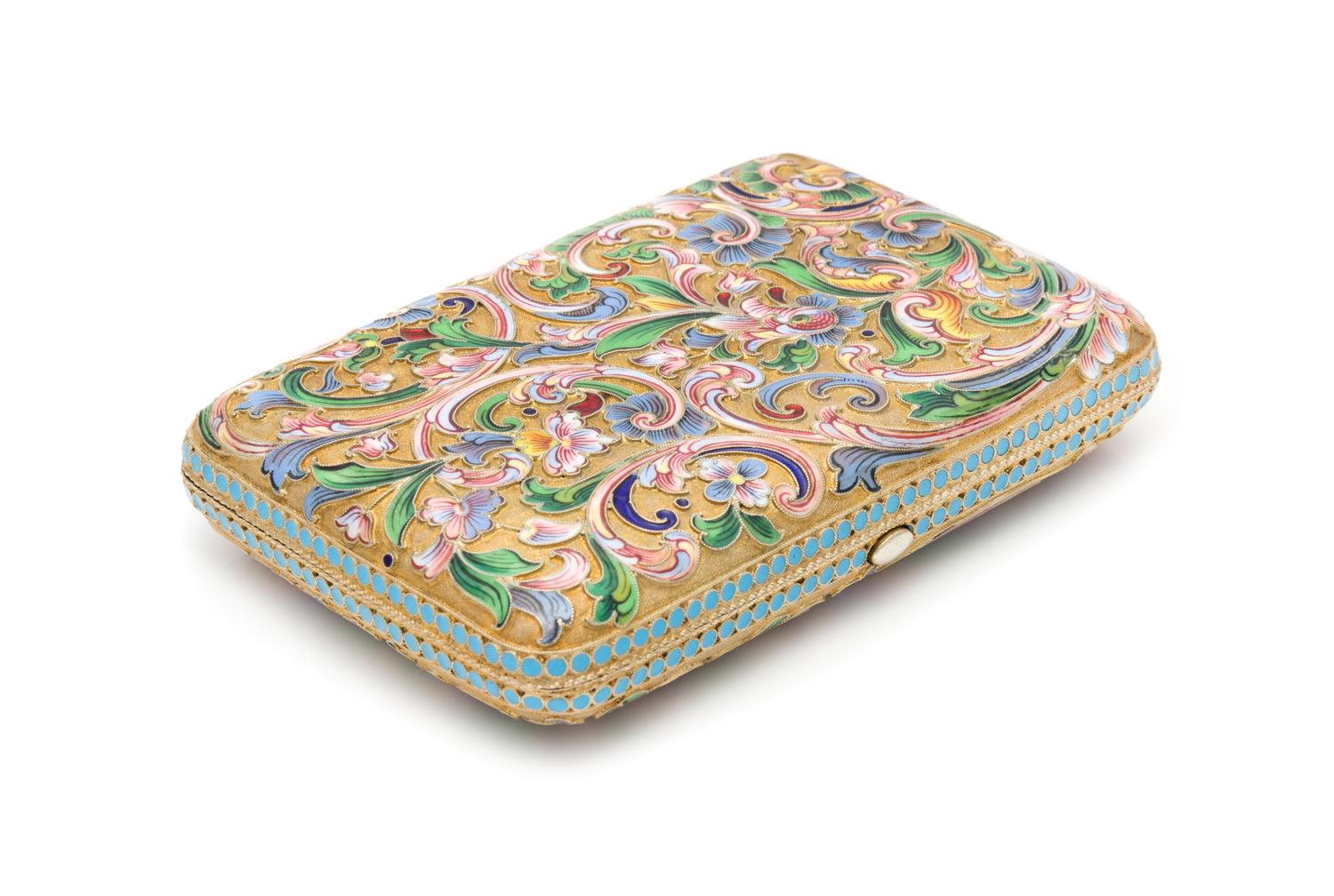 A Russian Silver-Gilt and Enameled Cigarette Case, Maker's Mark Obscured, 20th Century, the case with polychrome floral and foliate scr