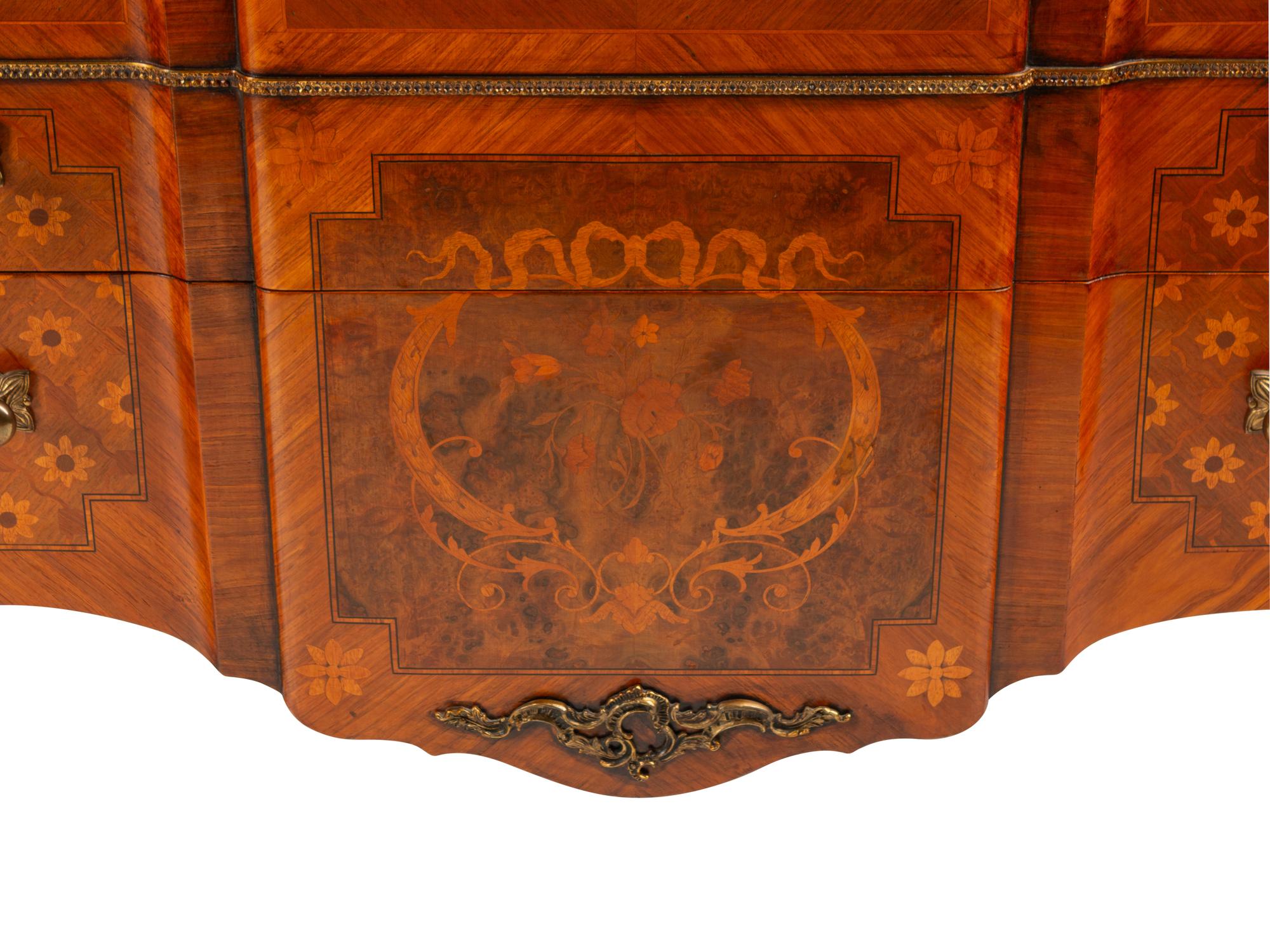 A Pair of Louis XV/XVI Transitional Style Gilt Bronze Mounted Marquetry Marble-Top Commodes