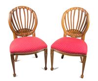 A Set of Six Walnut Dining Chairs Height 38 1/2 inches. — 20TH CENTURY