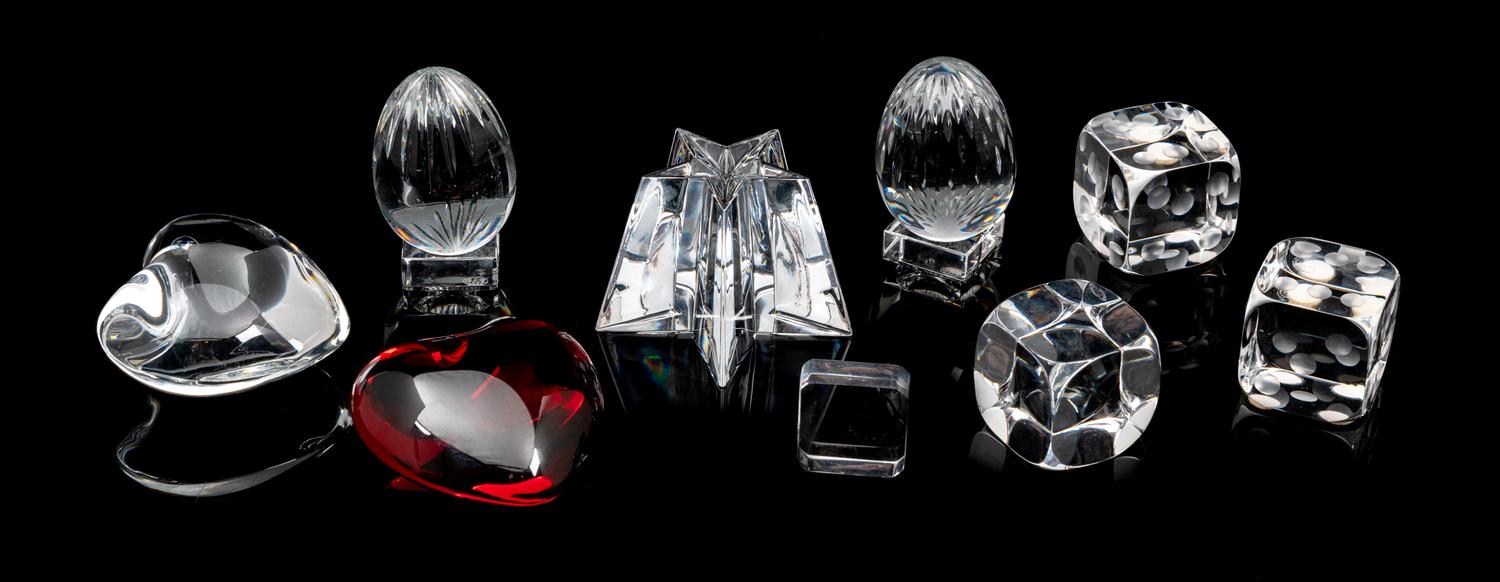 Eight Baccarat Small Ornaments Height of tallest 3 inches.