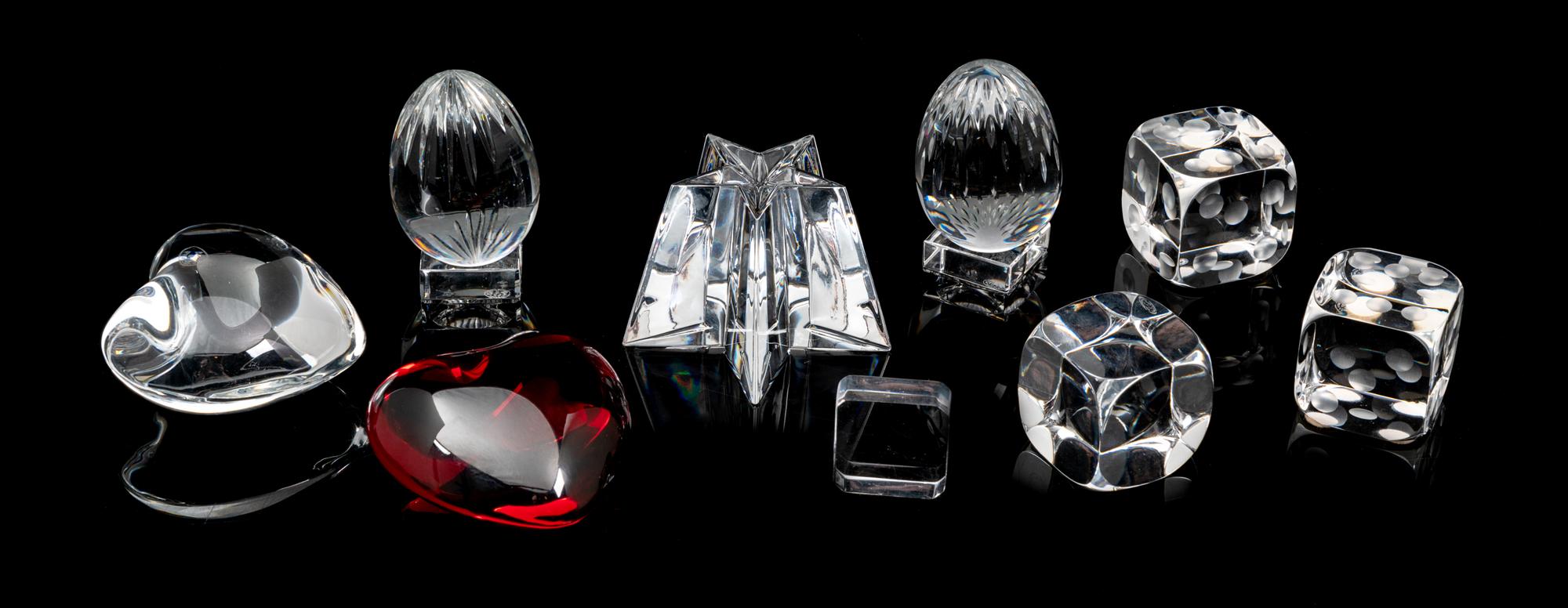 Eight Baccarat Small Ornaments Height of tallest 3 inches.