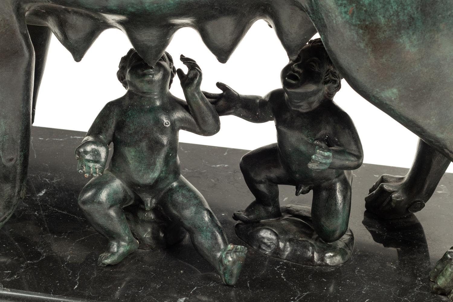 A Grand Tour Style Patinated Bronze Group of Lupa with Romulus and Remus