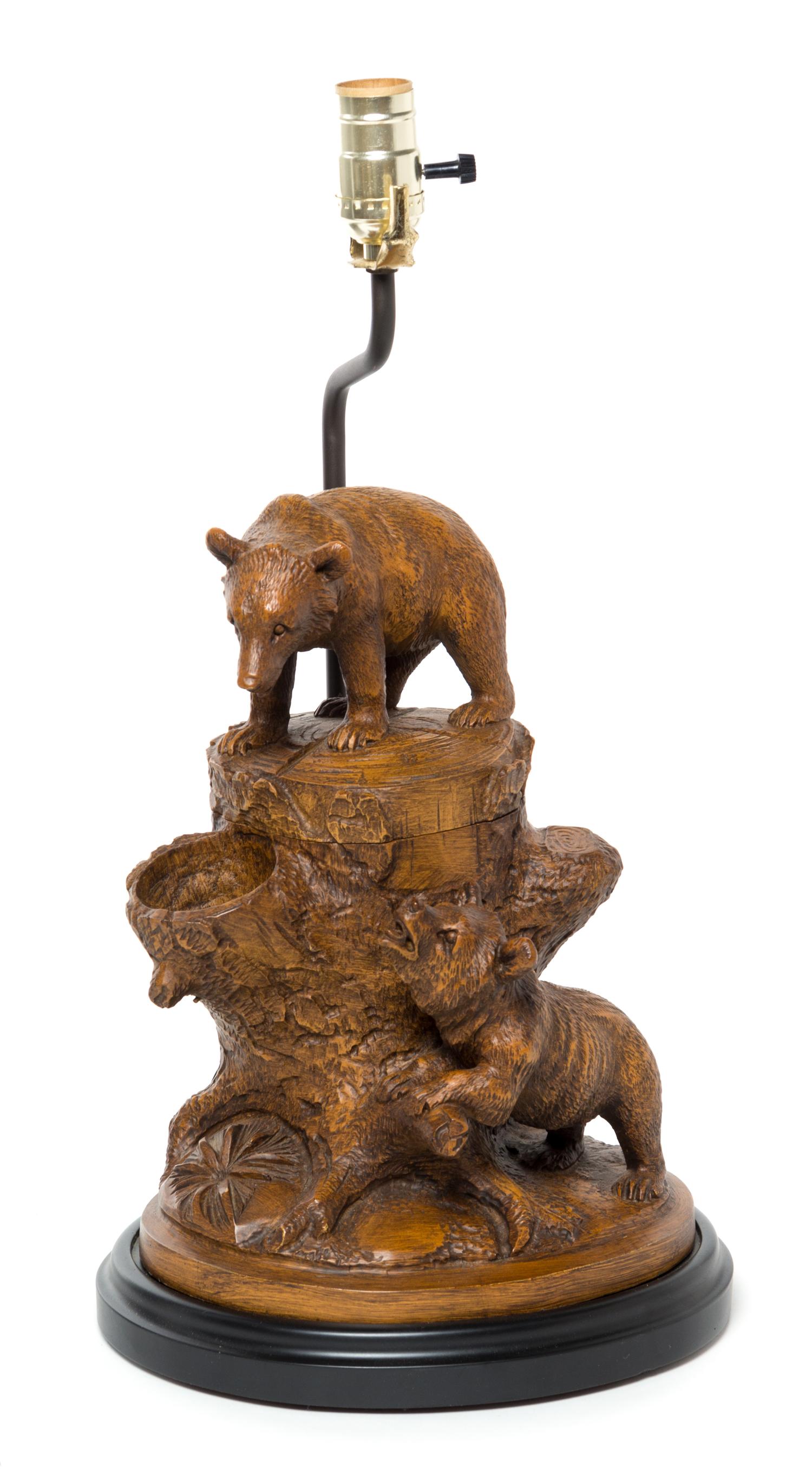 A Black Forest Style Resin Jar and Cover Height overall 19 1/2 inches. — 20TH CENTURY