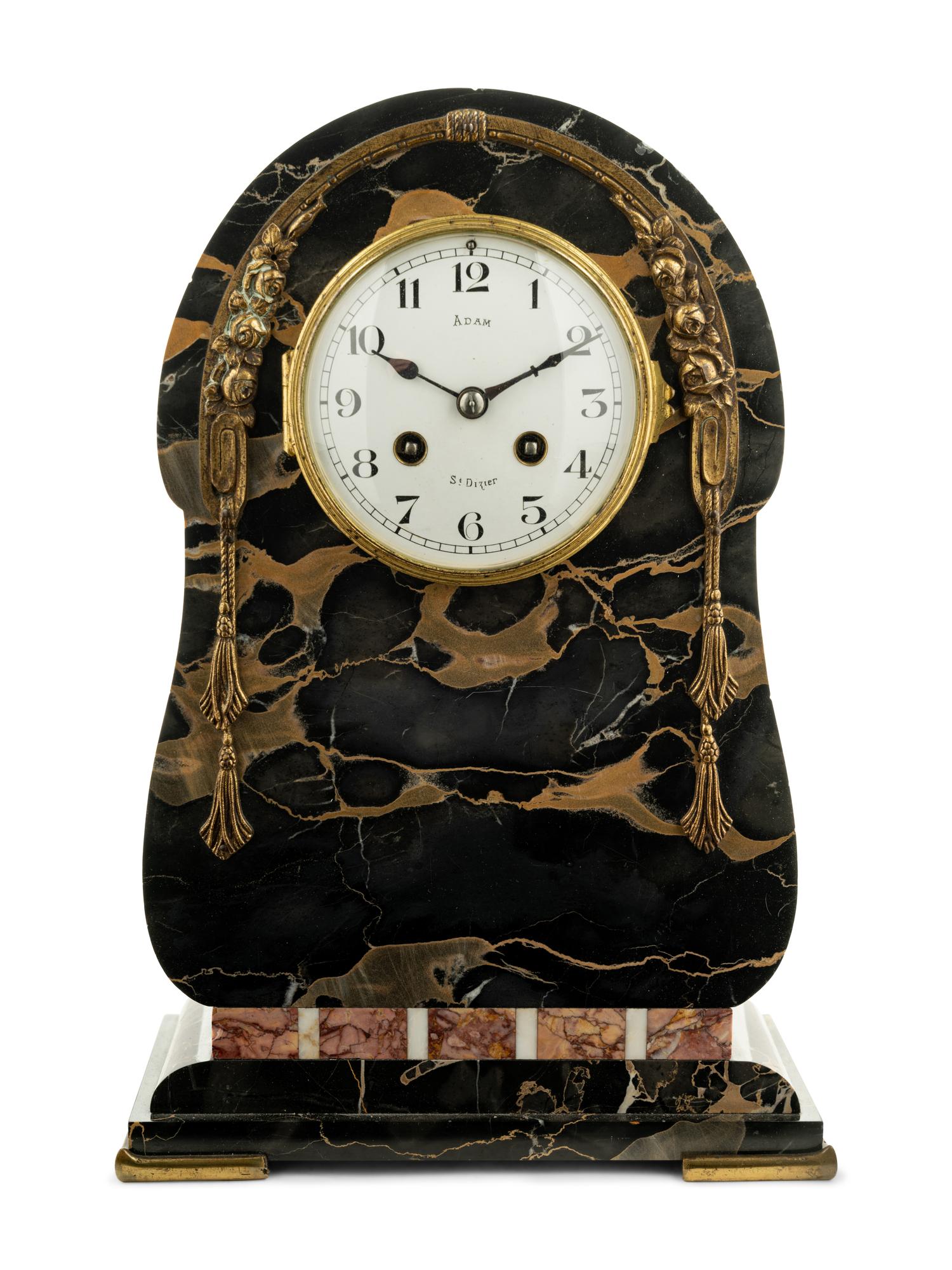 A Continental Gilt Bronze Mounted Marble Mantel Clock