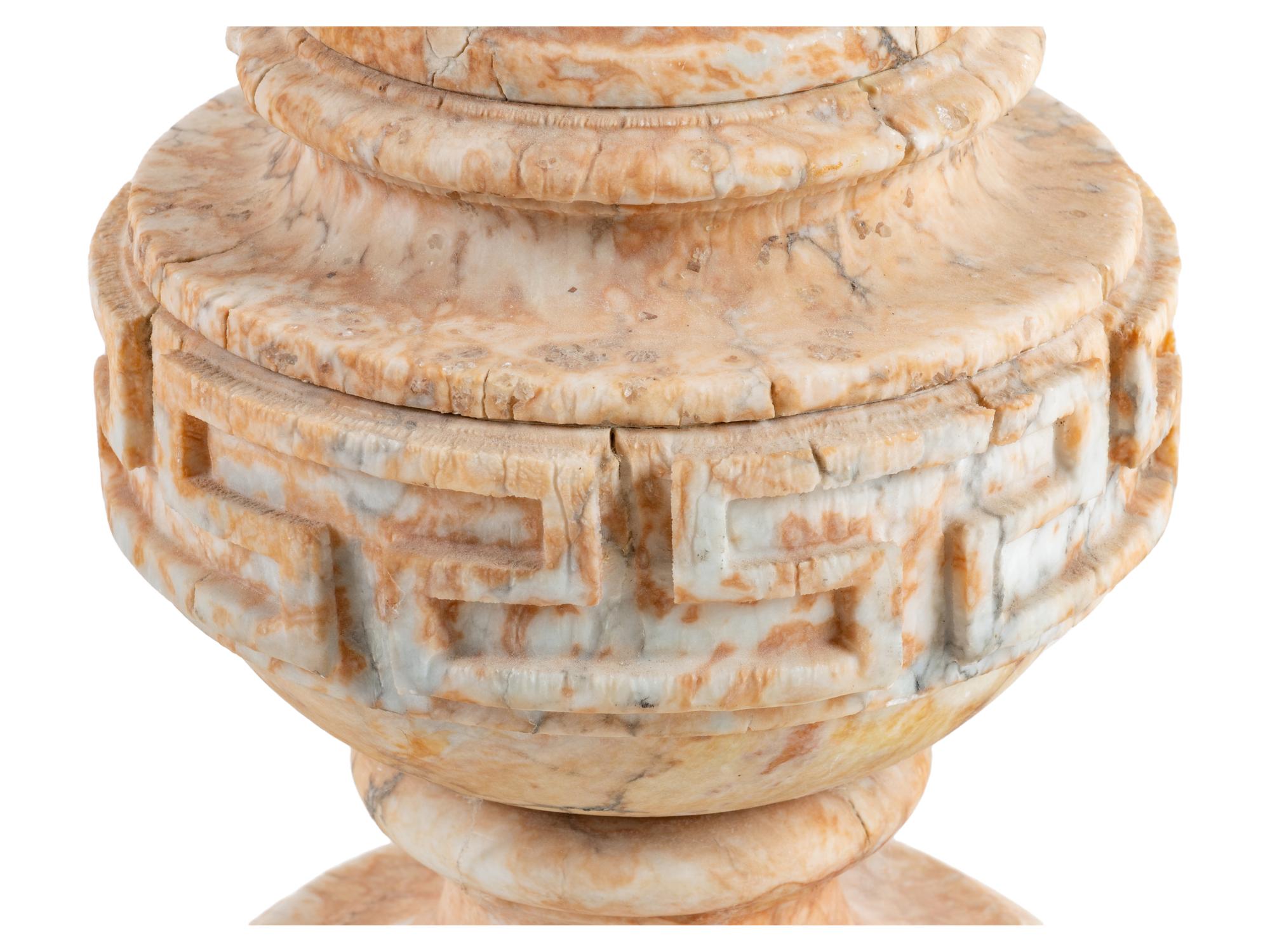 A Continental Carved Marble Pedestal