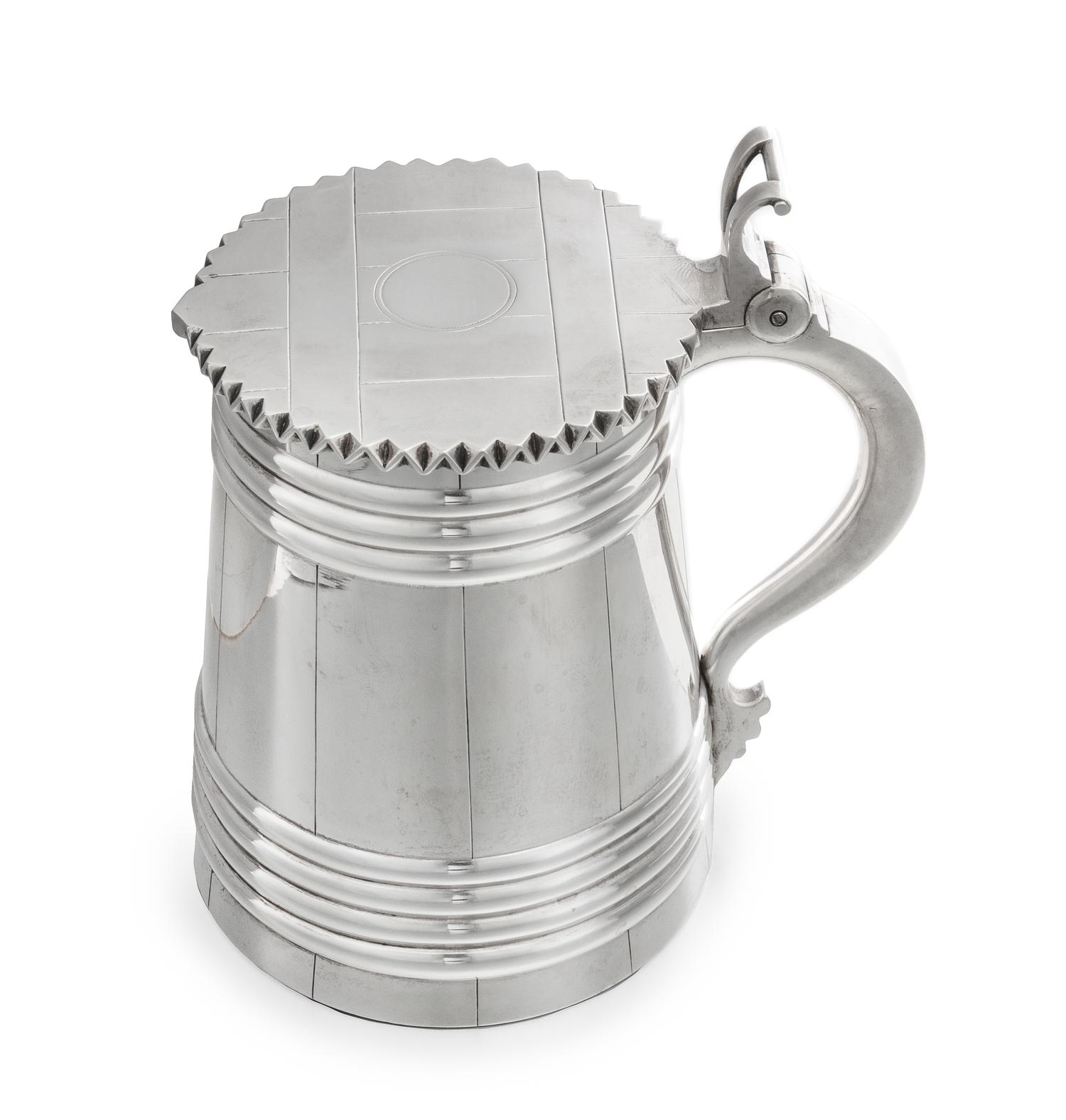 A Russian Silver Tankard, Mark of Pavel Sazikov with Imperial Warrant, Assay Mark B.C., St. Petersburg, 1869, the lid and body worked t