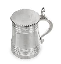 A Russian Silver Tankard, Mark of Pavel Sazikov with Imperial Warrant, Assay Mark B.C., St. Petersburg, 1869, the lid and body worked t