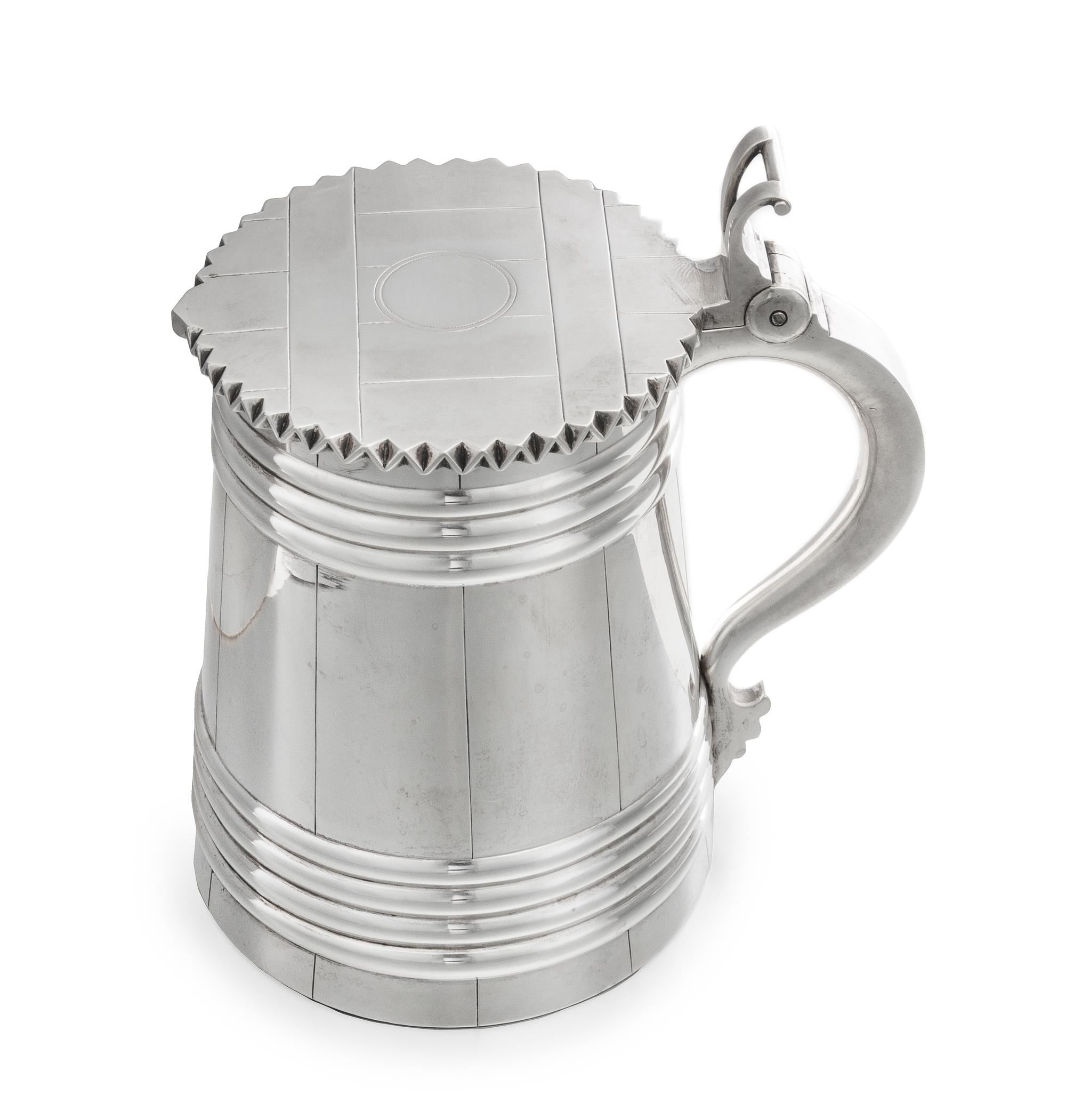 A Russian Silver Tankard, Mark of Pavel Sazikov with Imperial Warrant, Assay Mark B.C., St. Petersburg, 1869, the lid and body worked t