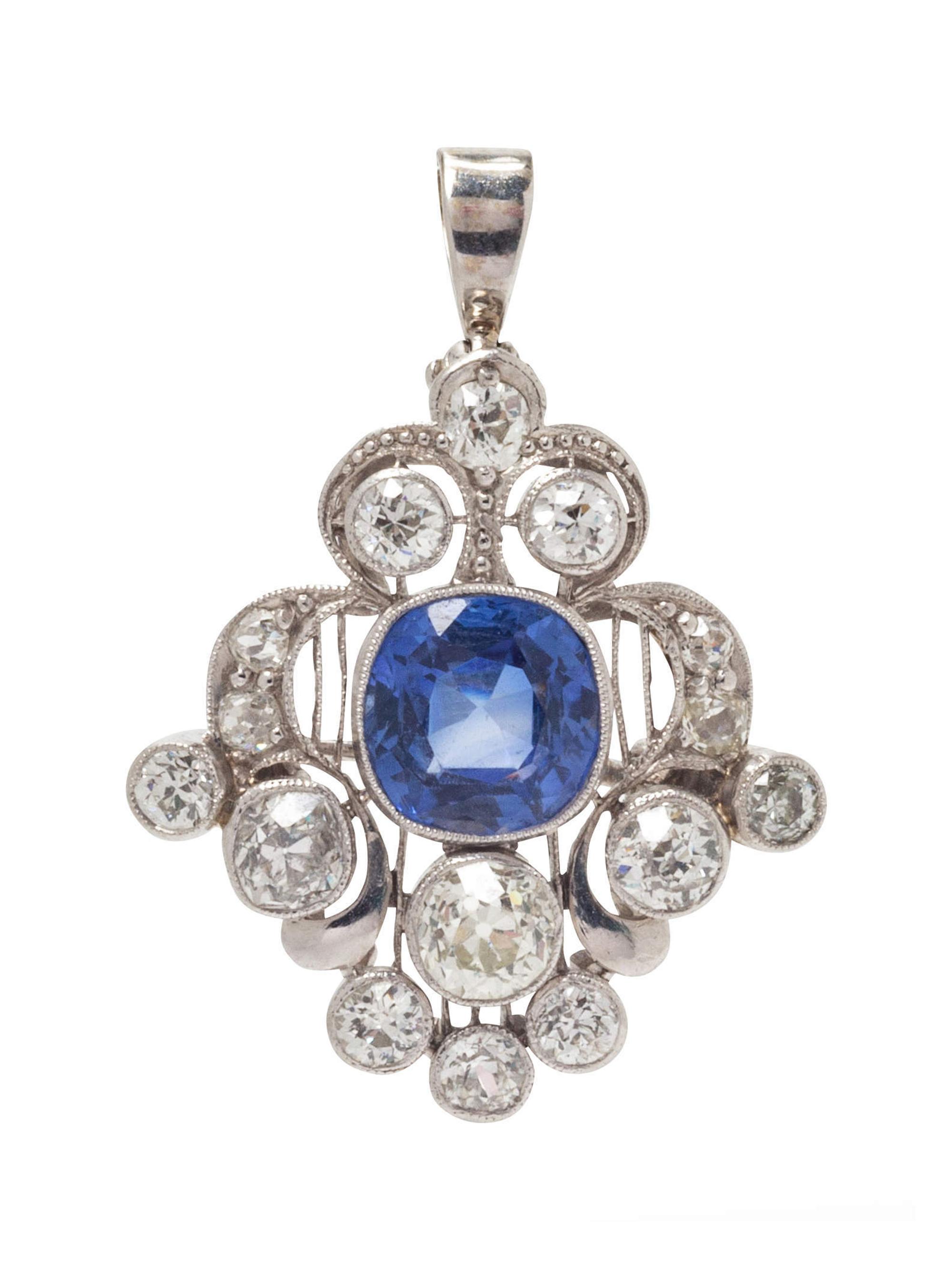 A Platinum, Synthetic Sapphire and Diamond Pendant/Brooch,