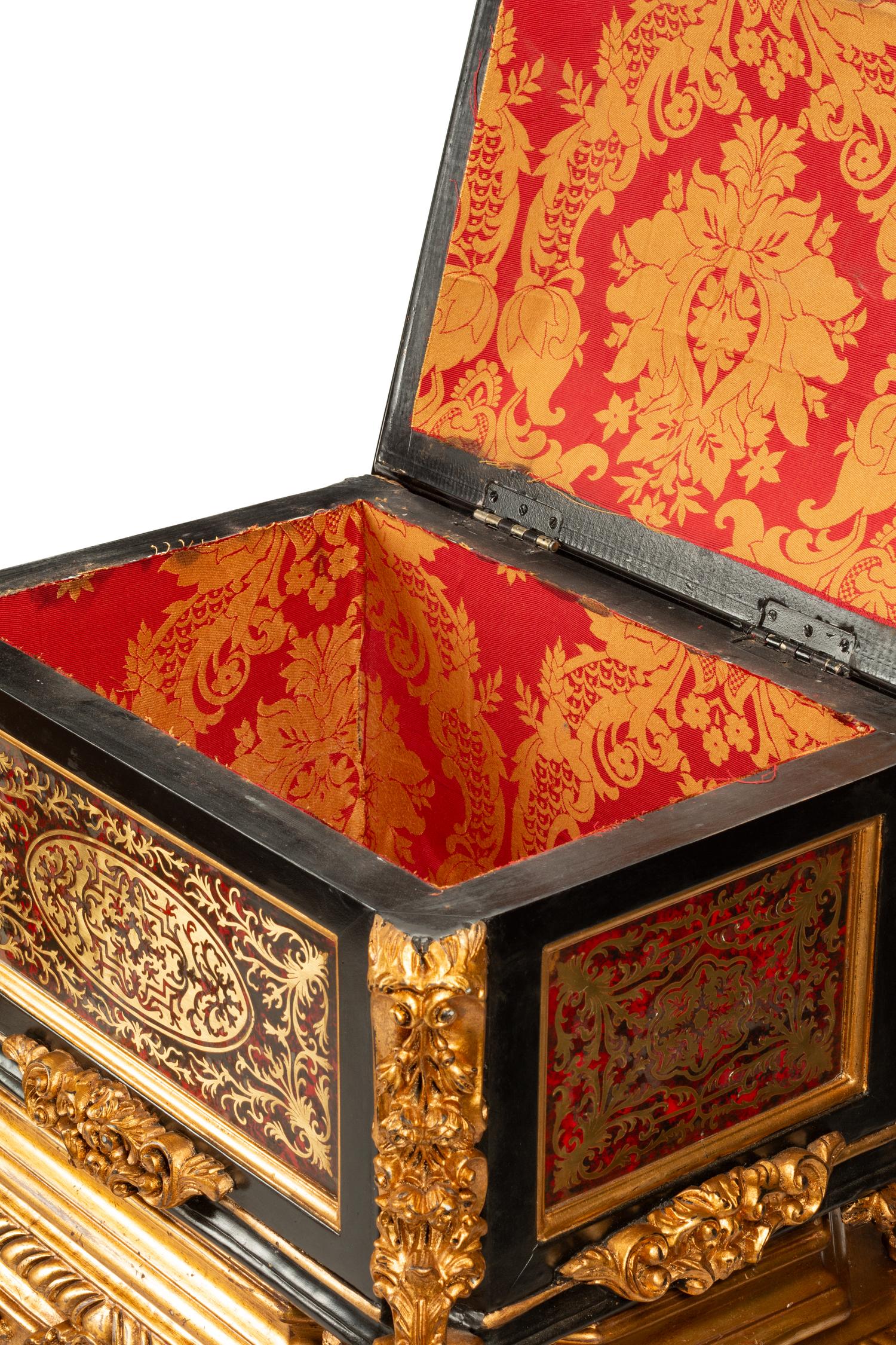 A Pair of Boulle Marquetry and Giltwood Caskets on Giltwood Stands