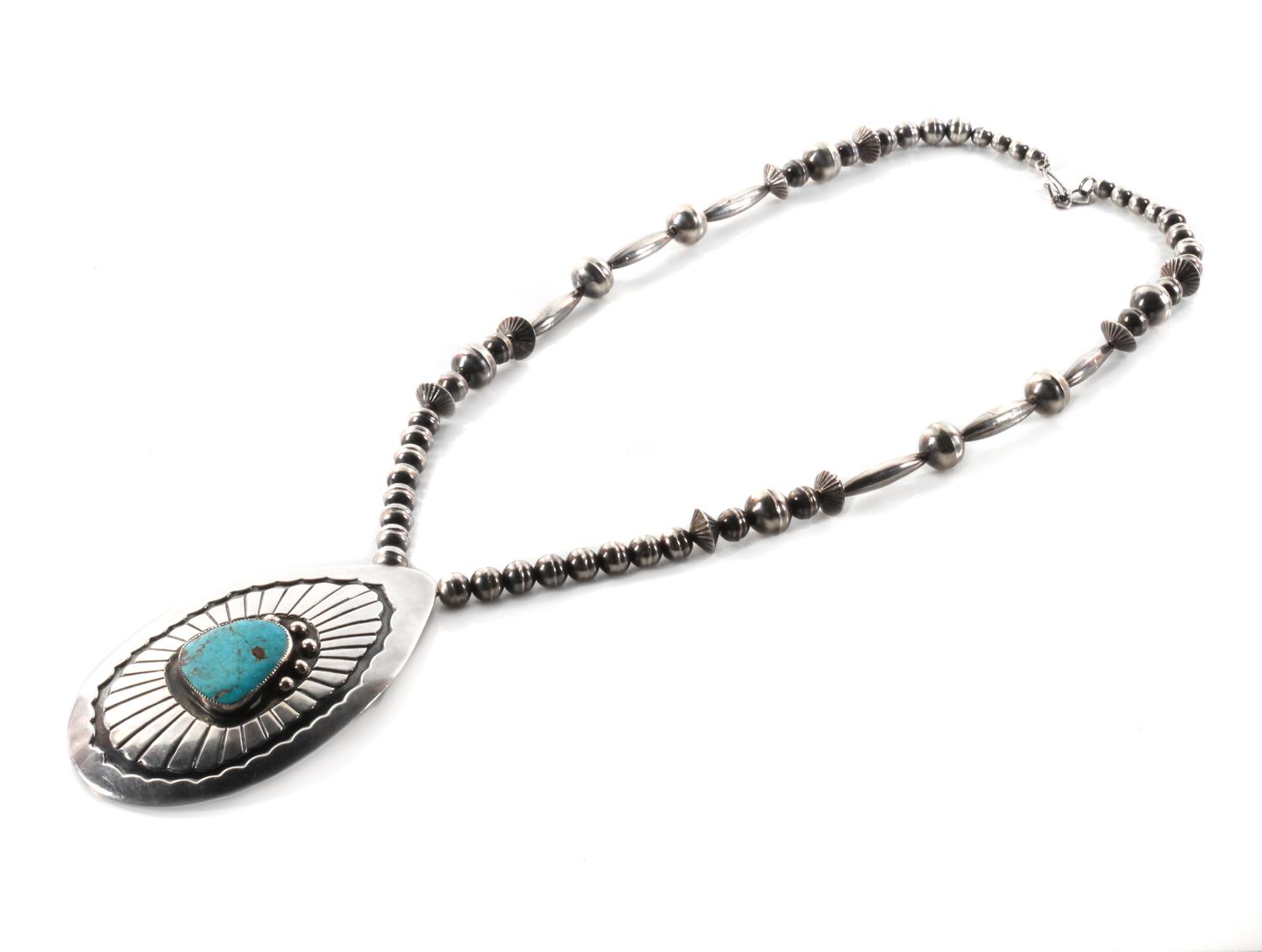 Southwestern Silver and Turquoise Pendant Height of pendant 3 3/4 inches.