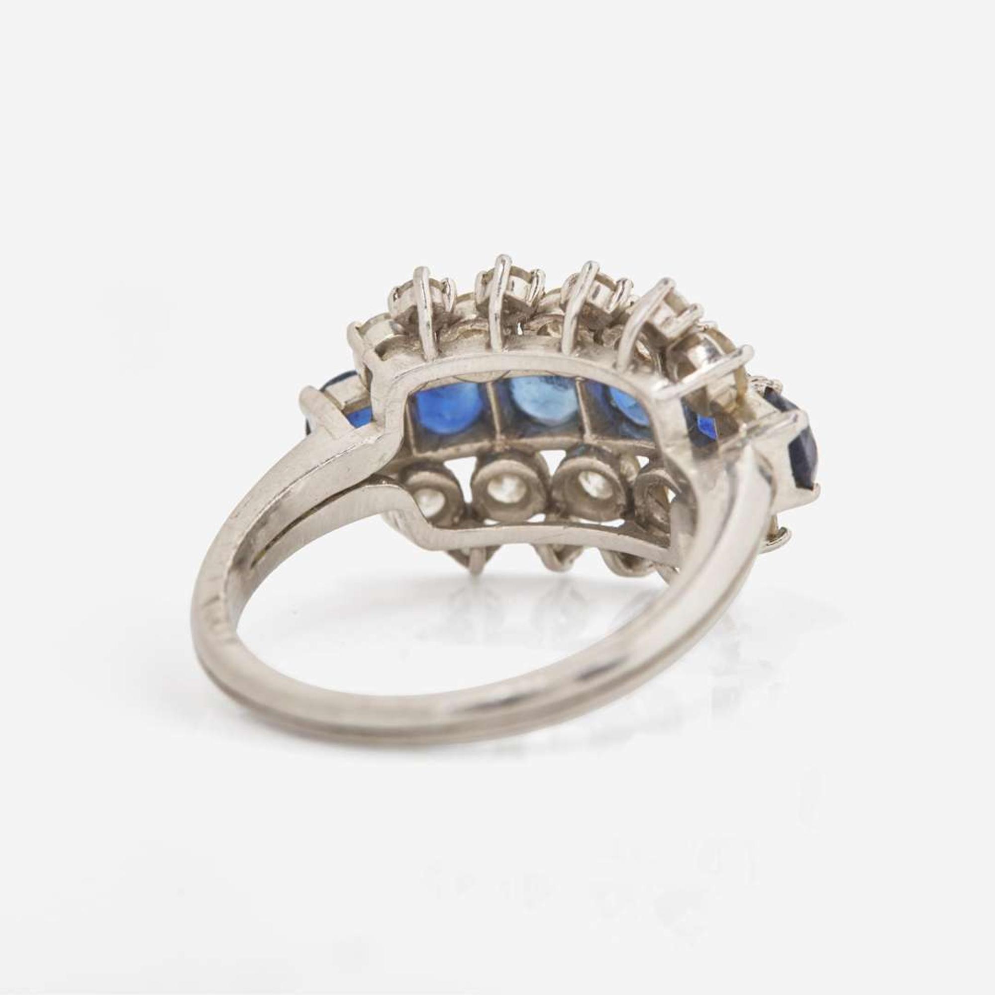 A J.E. Caldwell Platinum, Sapphire, and Diamond Ring