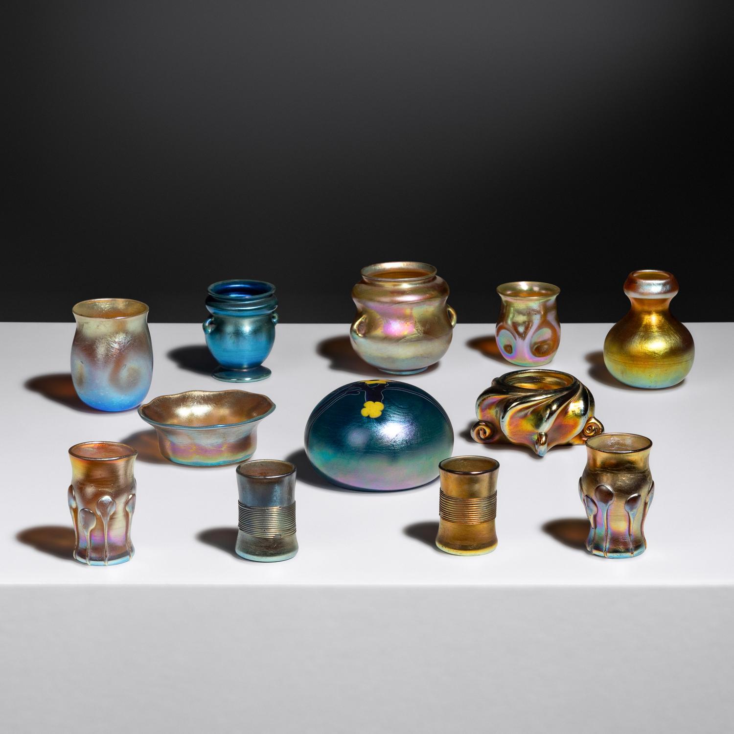 Group of Twelve Favrile Glass Cabinet Vases, Cordials and a Salt Shaker, c. 1910 Tiffany Studios