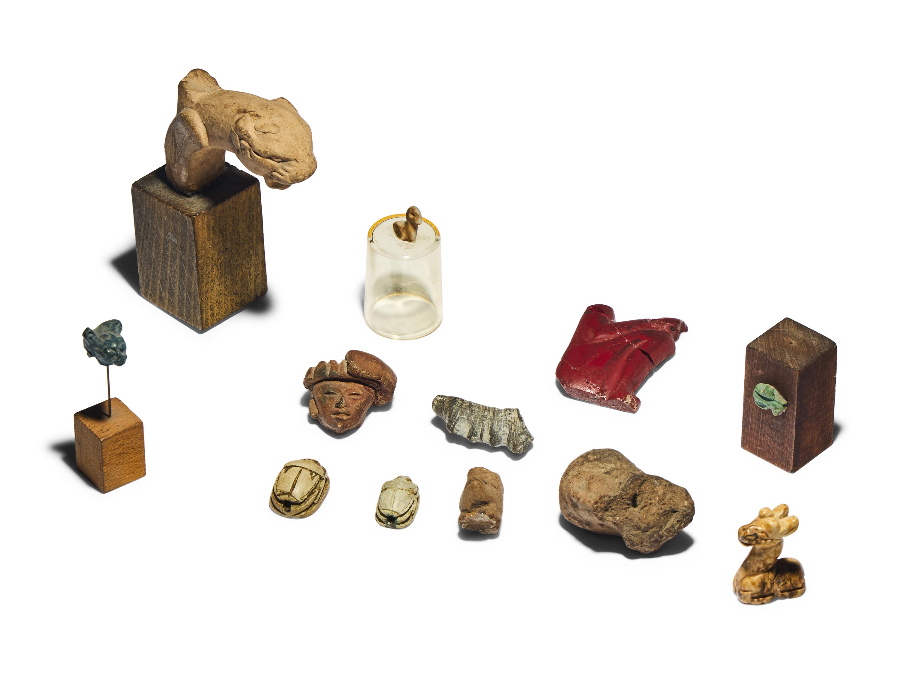 A Group of Nine Small Ancient Objects and Fragments
