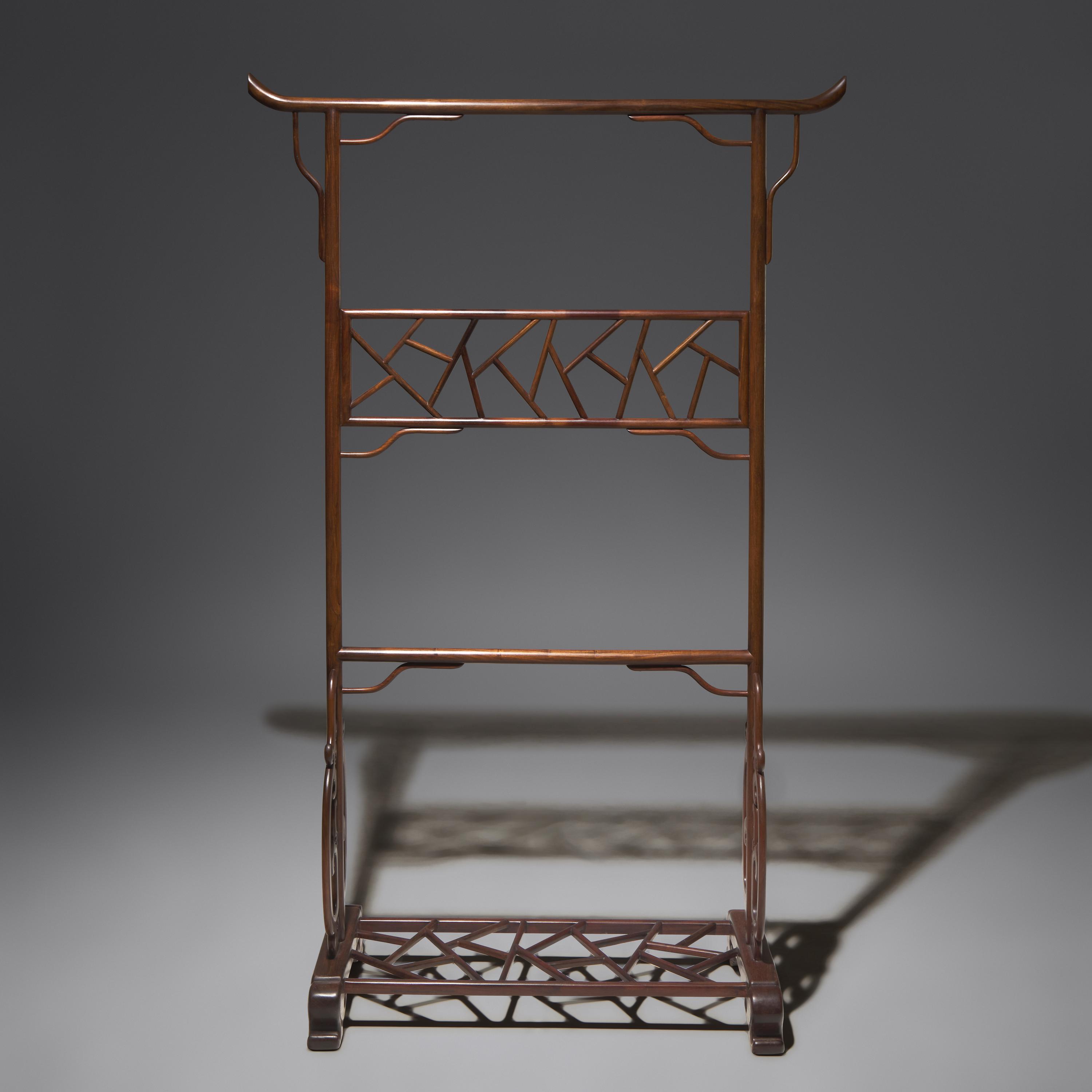 A Chinese Carved Hongmu Clothes Stand, Yijia, 20th Century 近代 紅木透雕冰梅紋衣架