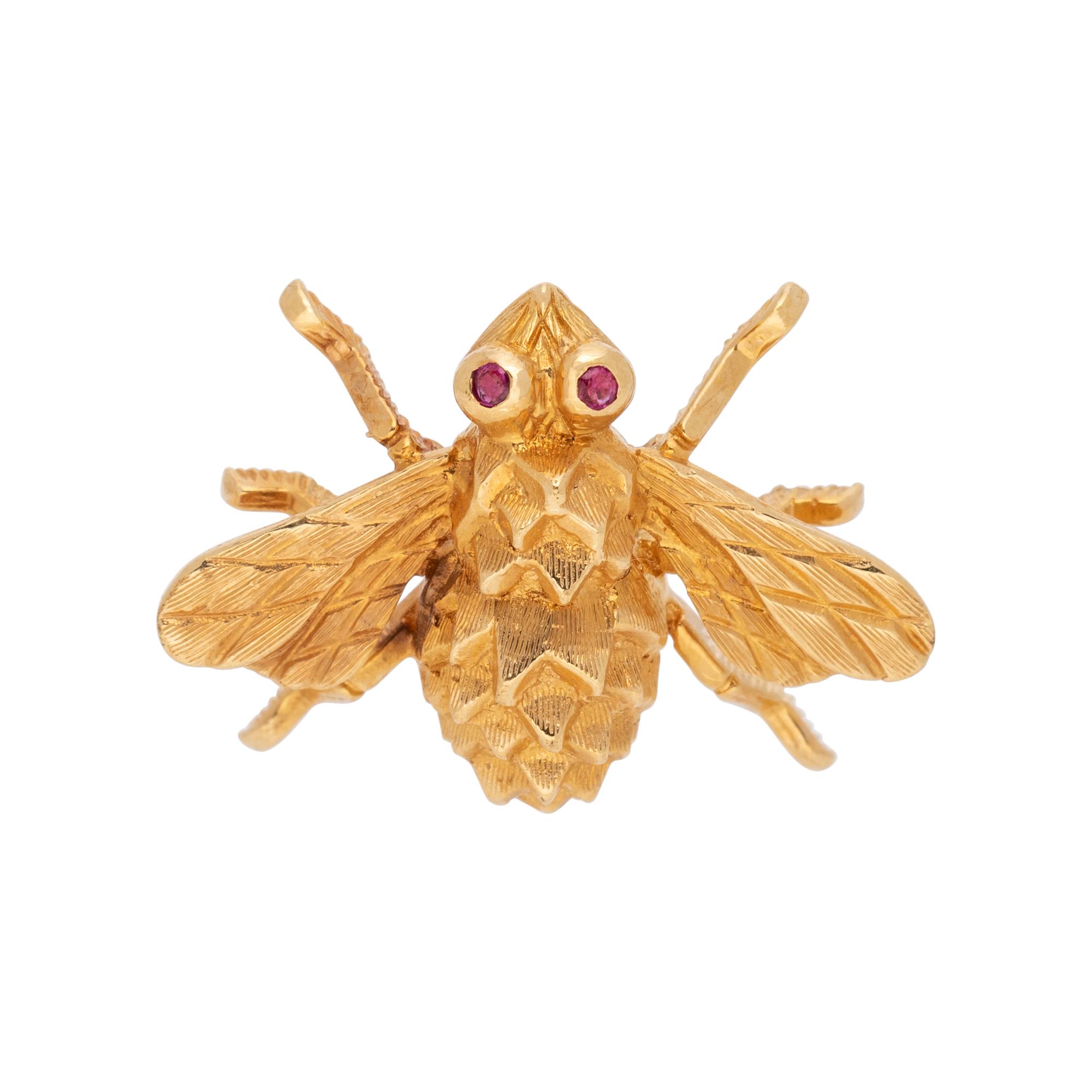 COLLECTION OF YELLOW GOLD BROOCHES